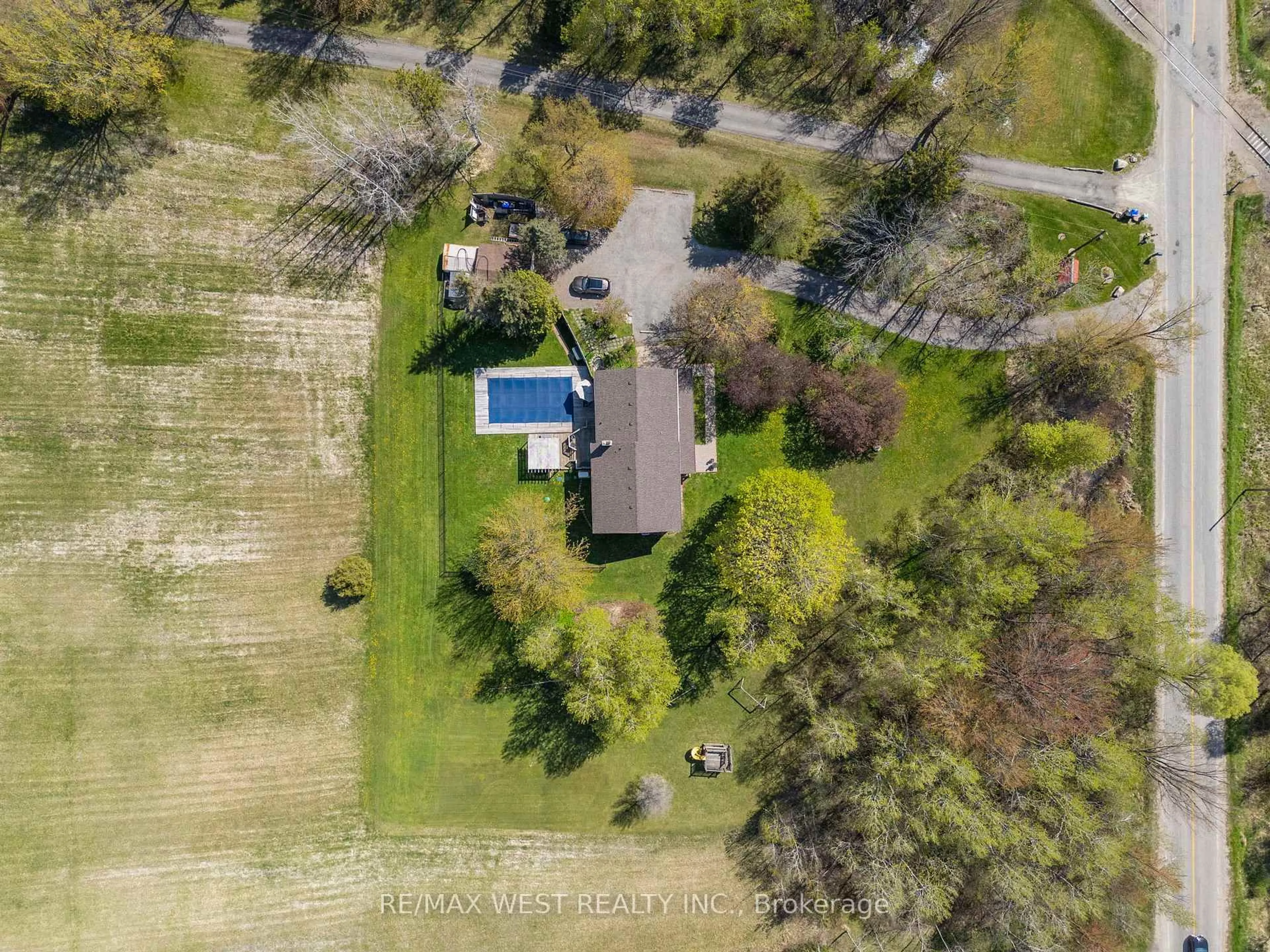 A pic from outside/outdoor area/front of a property/back of a property/a pic from drone, water/lake/river/ocean view for 6492 7th Line, New Tecumseth Ontario L0G 1A0