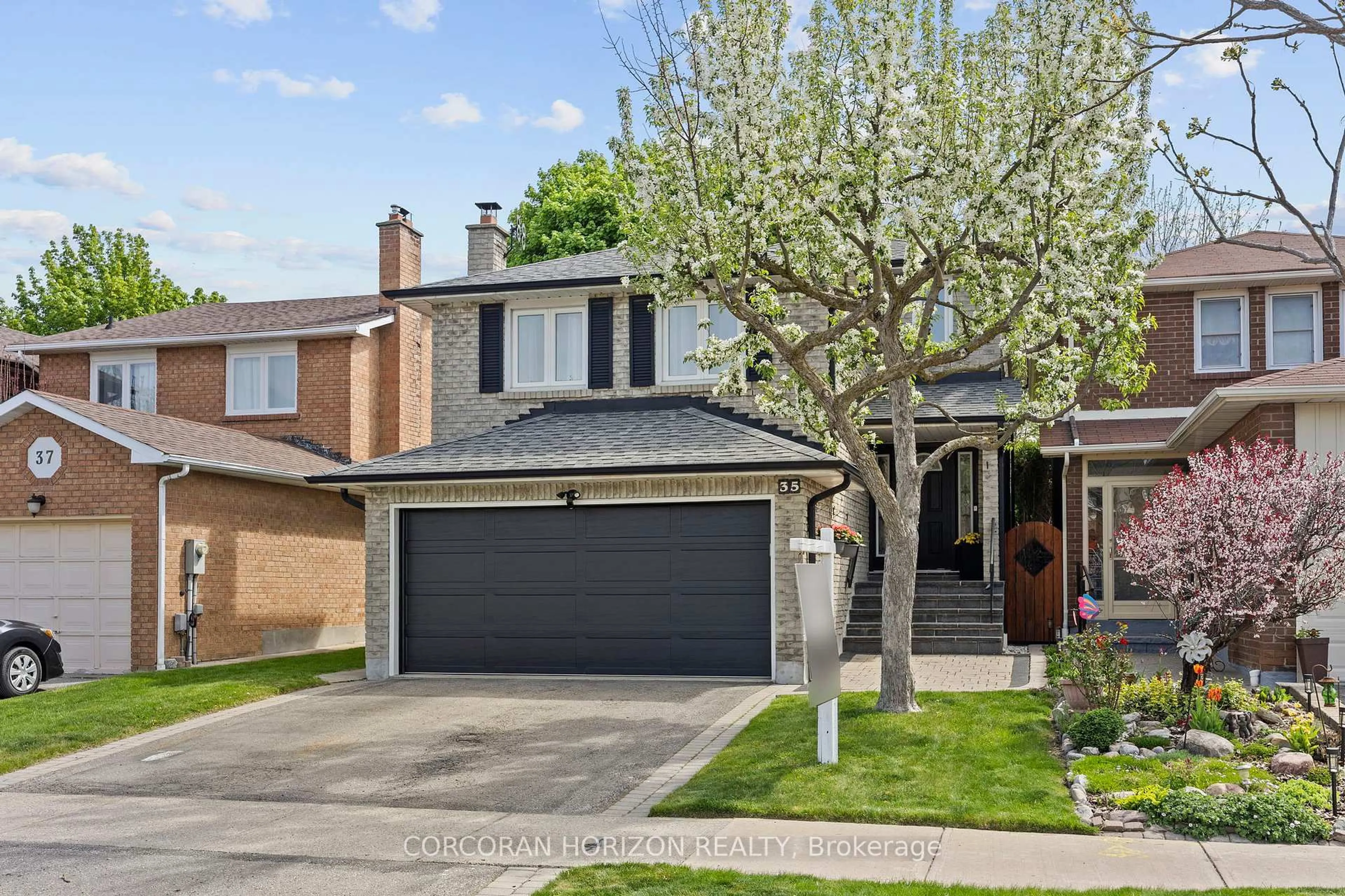 Home with brick exterior material, street for 35 McKelvey Dr, Markham Ontario L3T 5X6