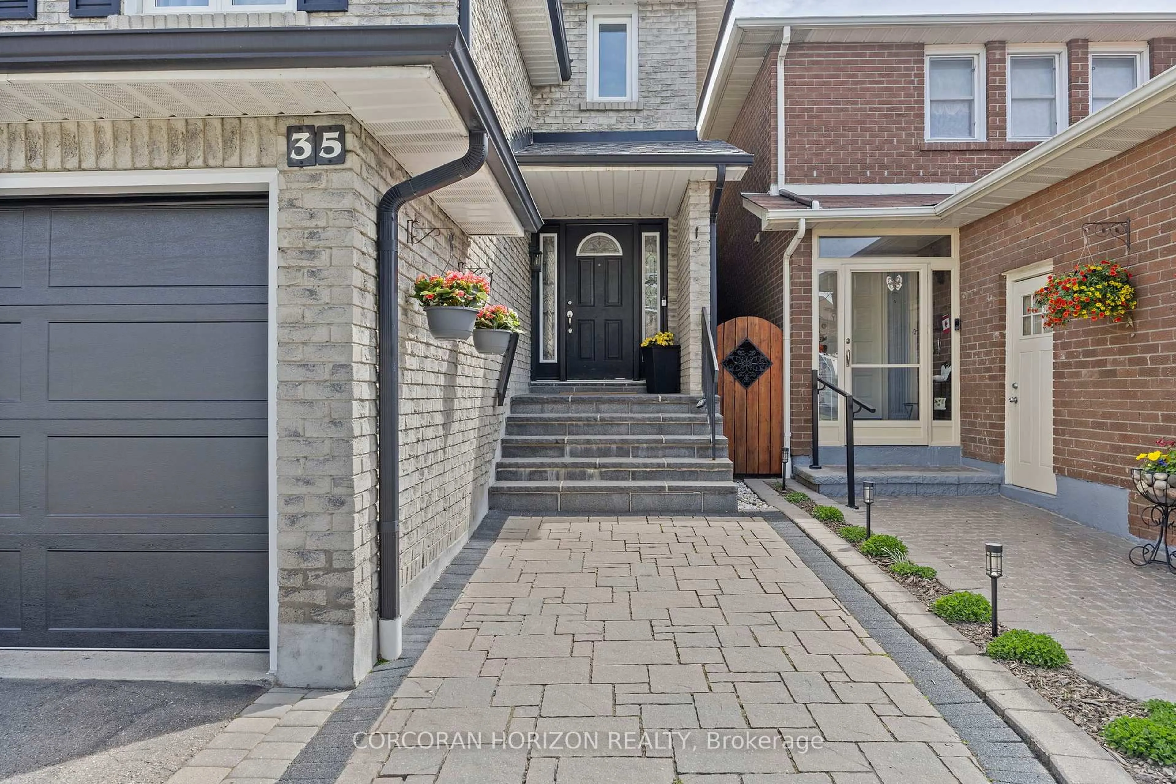 Home with brick exterior material, street for 35 McKelvey Dr, Markham Ontario L3T 5X6