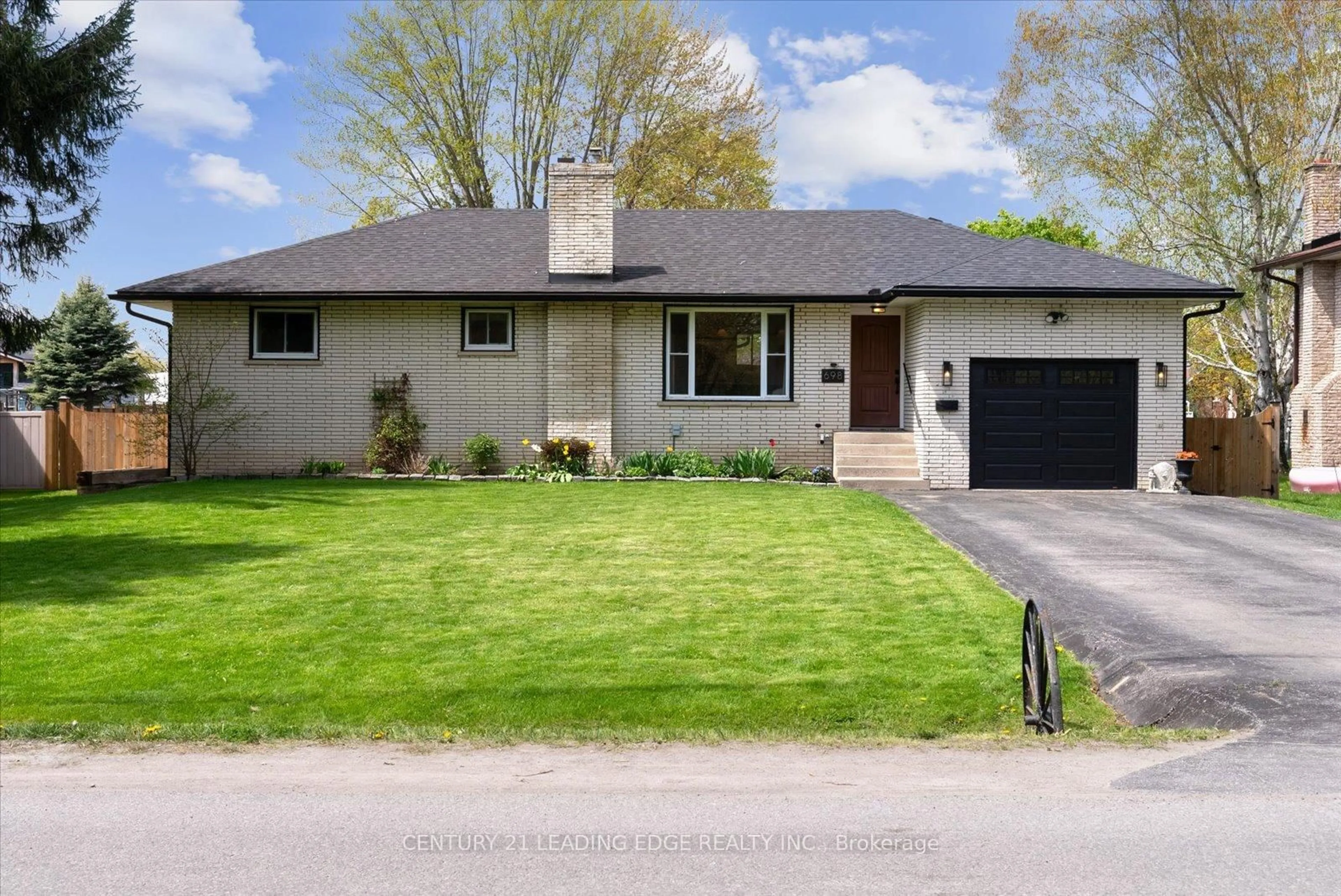 Home with brick exterior material, street for 698 Lake Dr, Georgina Ontario L4P 1V1