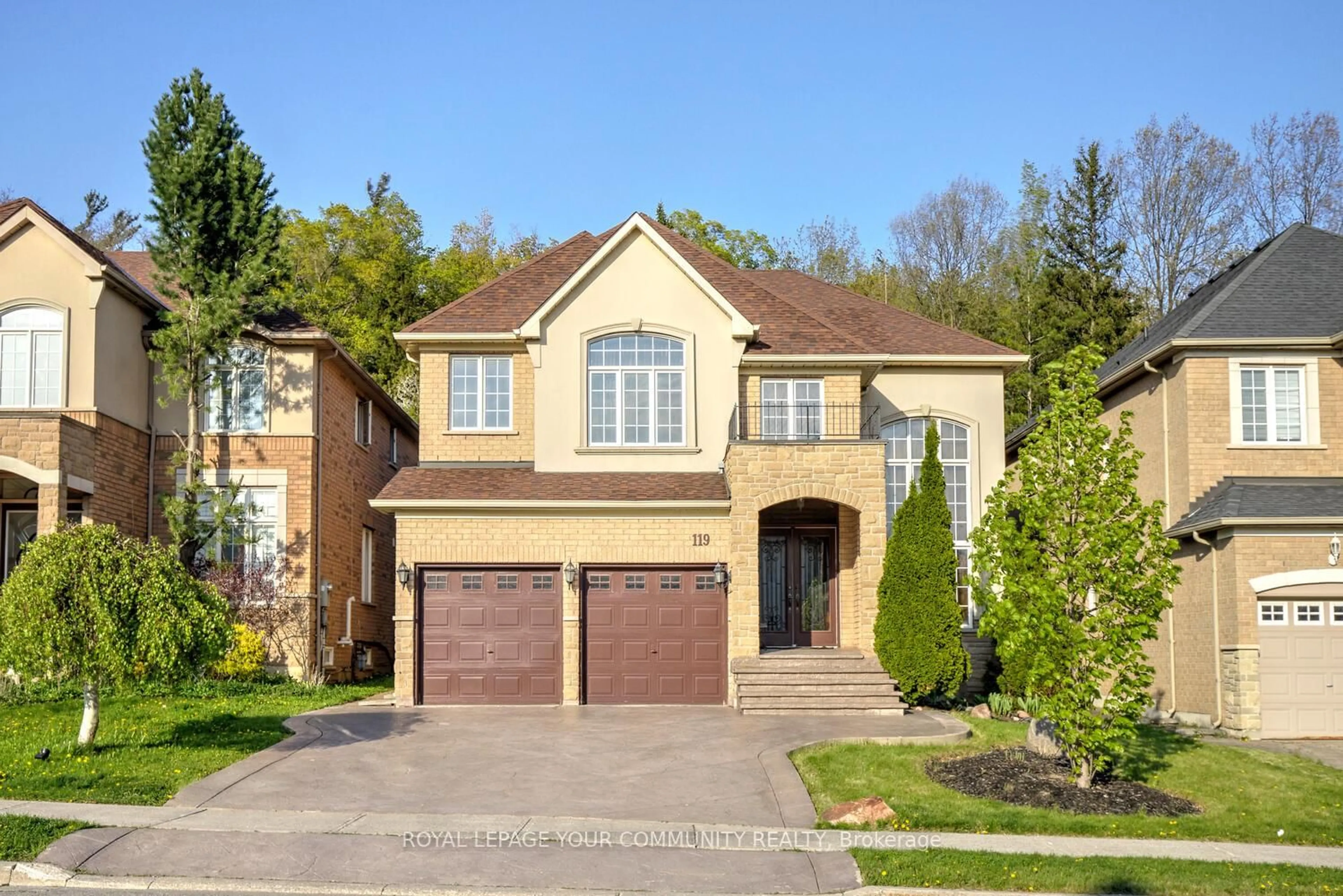 Home with brick exterior material, street for 119 Thornhill Woods Dr, Vaughan Ontario L4J 8R5