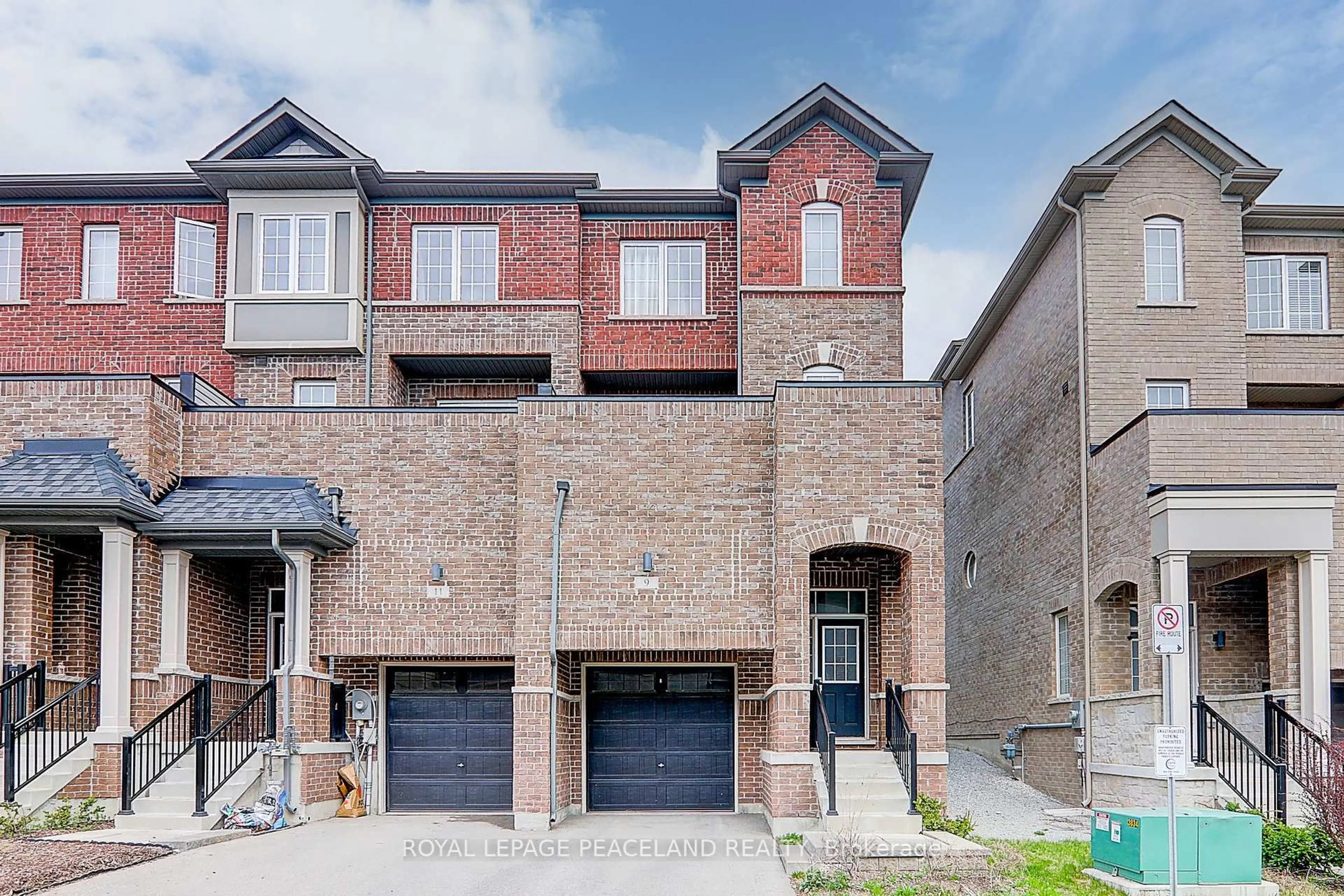 Home with brick exterior material, street for 9 Heswall Lane, Newmarket Ontario L3Y 0E3