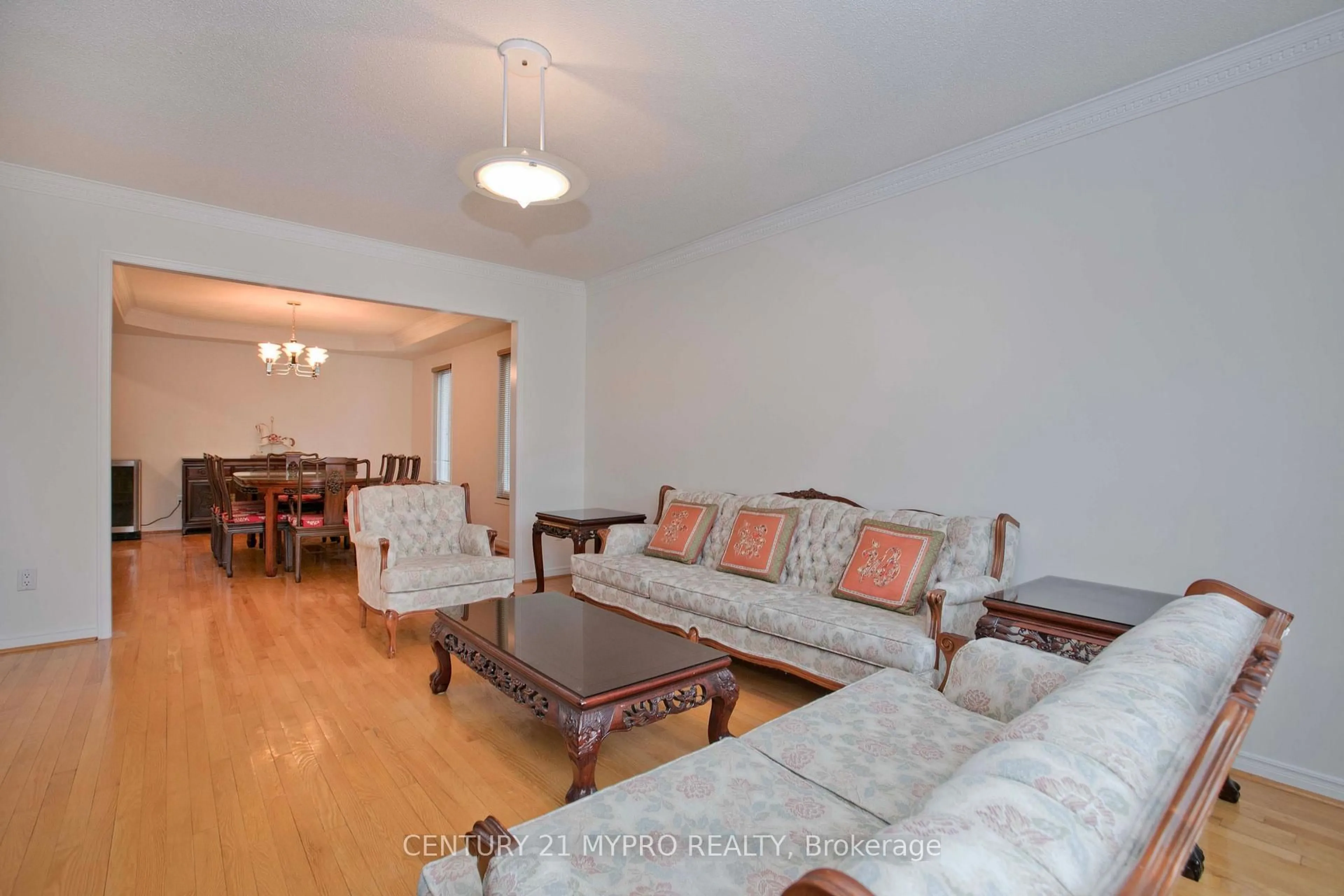 Living room with furniture, wood/laminate floor for 29 Webber Cres, Markham Ontario L3R 2L3