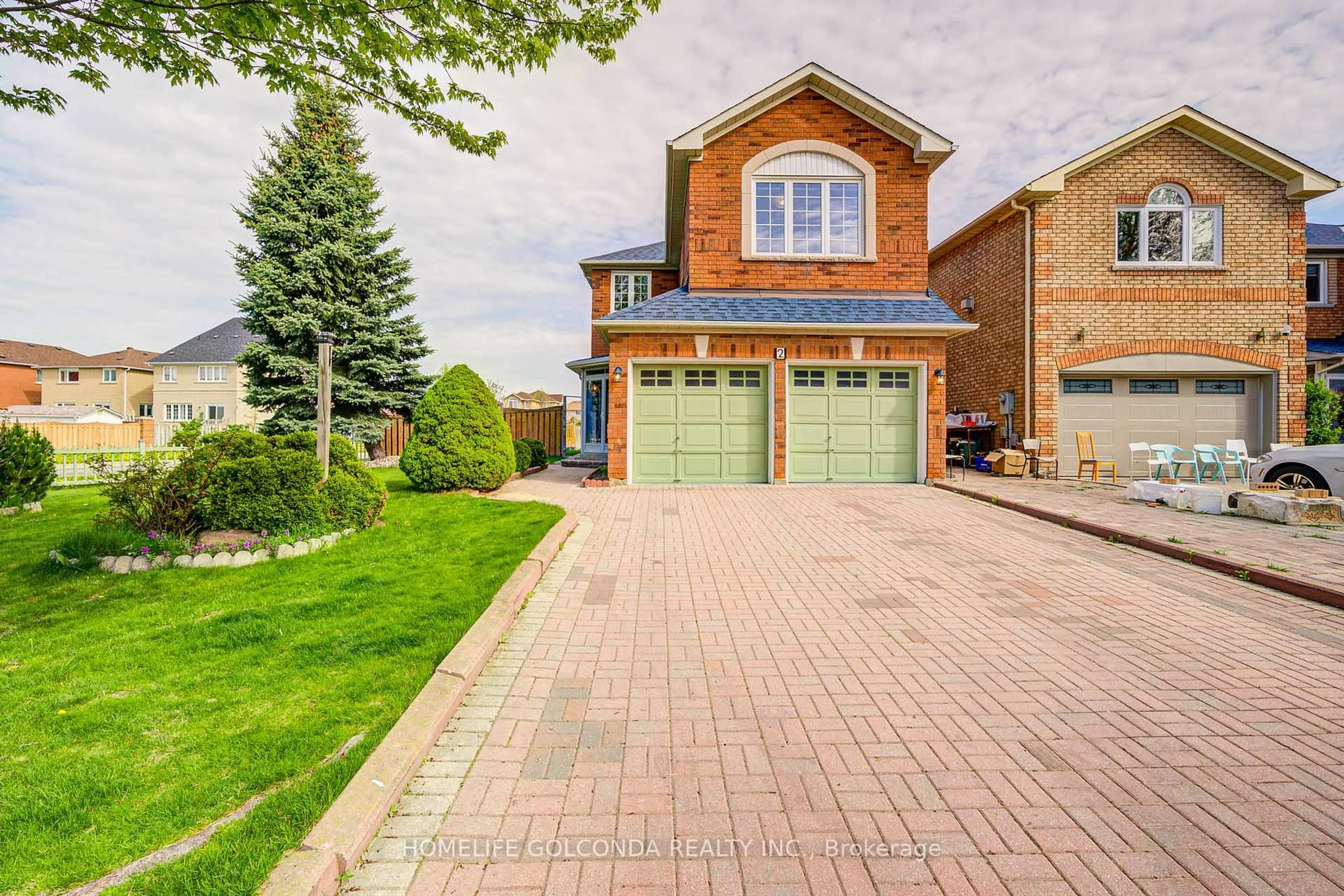 Home with brick exterior material, street for 2 Eastpine Dr, Markham Ontario L3R 4Z2