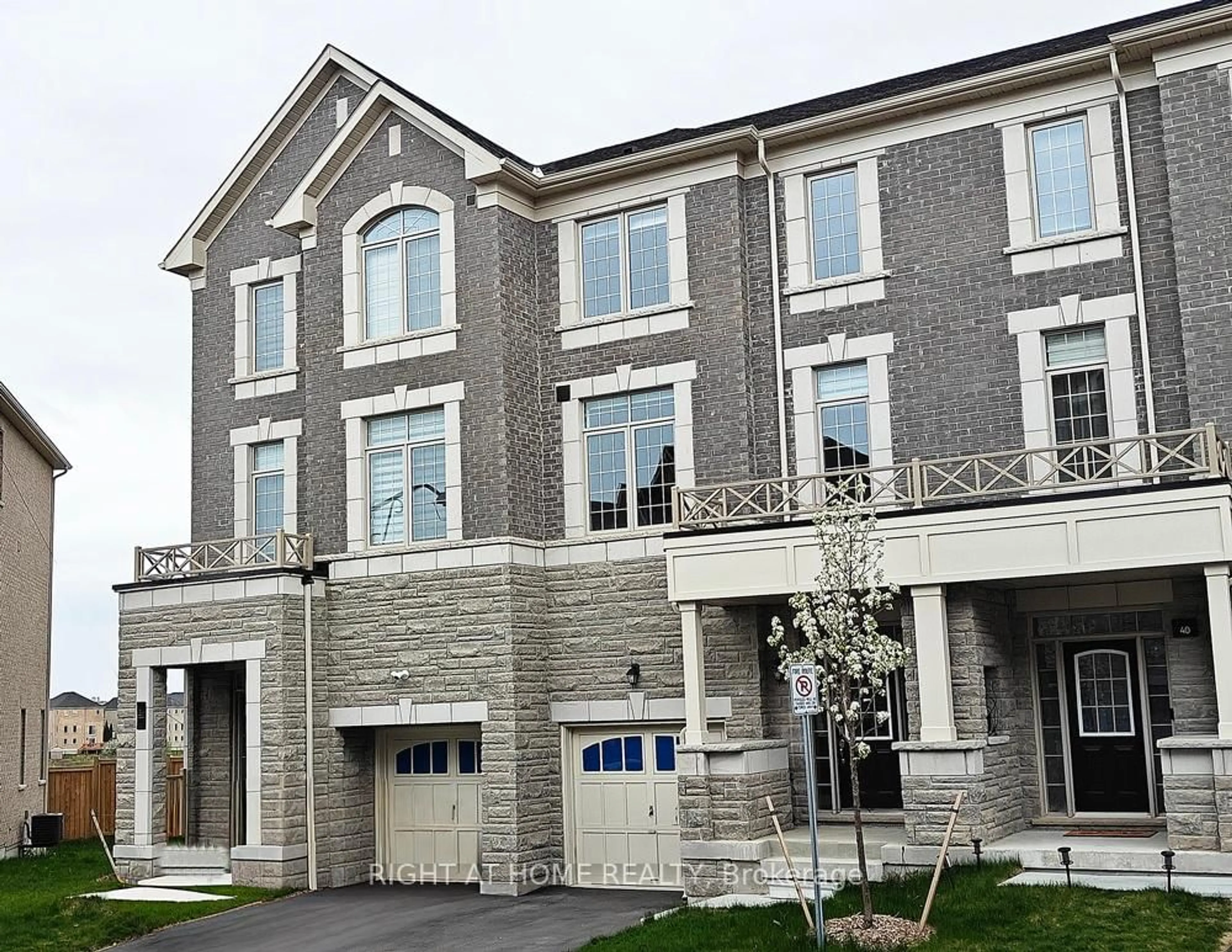 Home with brick exterior material, street for 36 Andress Way, Markham Ontario L3S 0E9