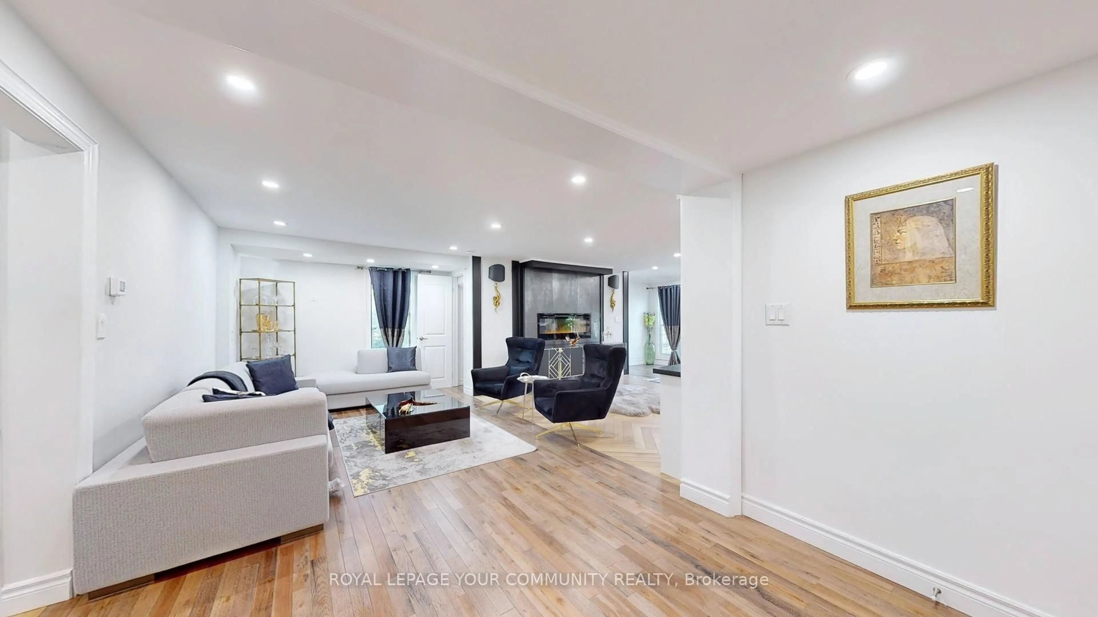 Living room with furniture, wood/laminate floor for 64 Machell Ave, Aurora Ontario L4G 2R7