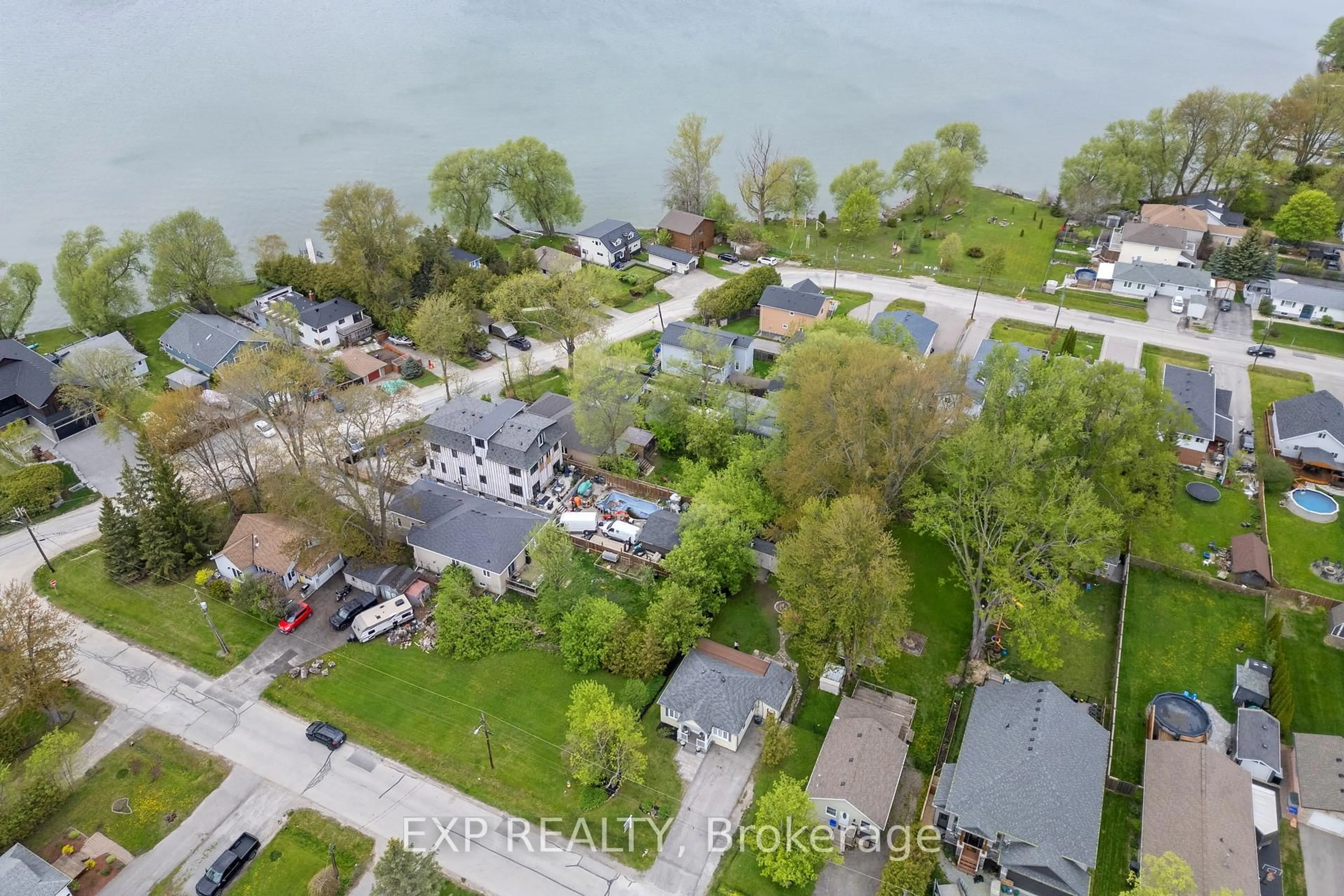 A pic from outside/outdoor area/front of a property/back of a property/a pic from drone, water/lake/river/ocean view for 254 Royal Rd, Georgina Ontario L4P 2T8