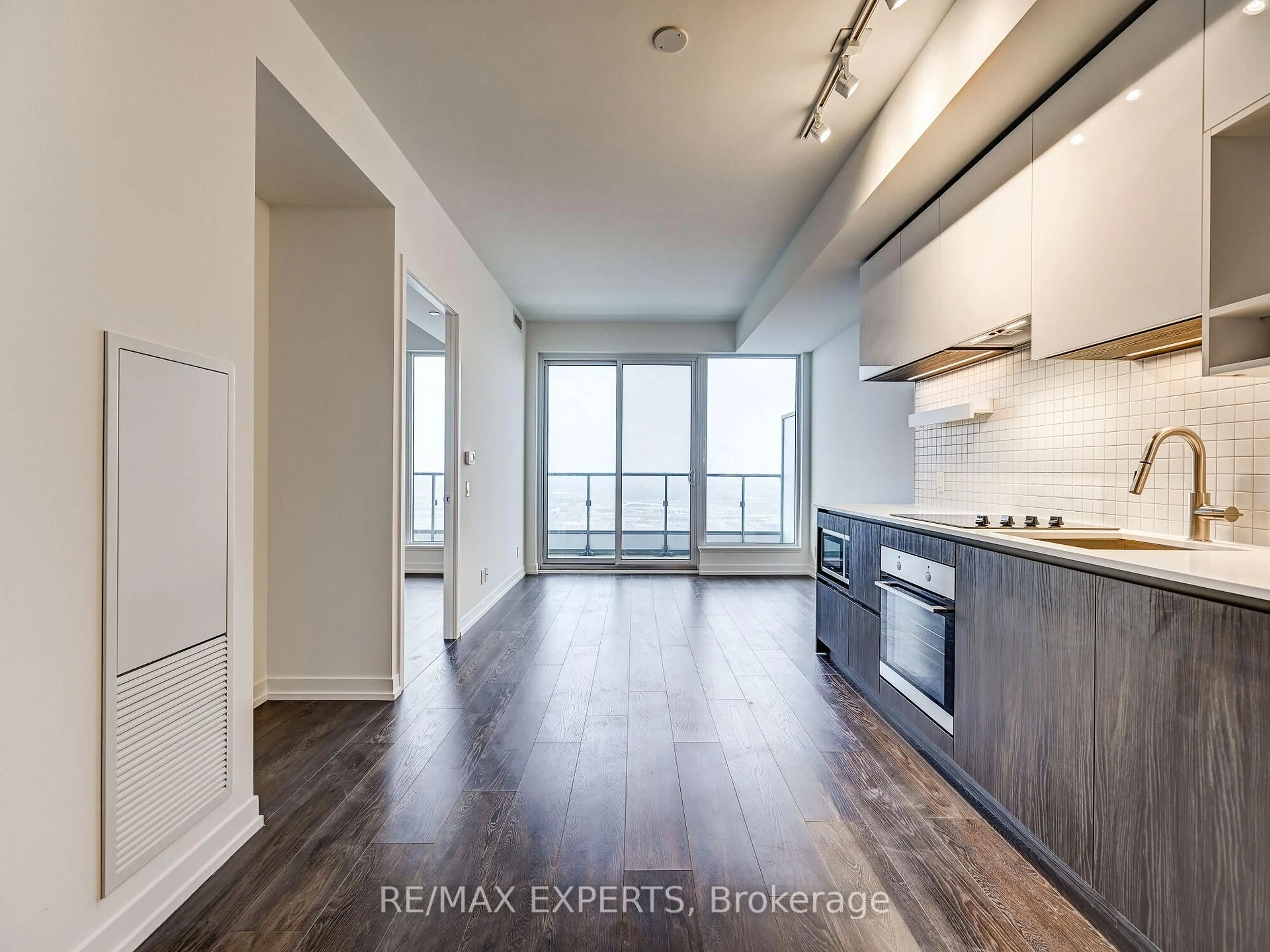 Open concept kitchen, wood/laminate floor for 5 Buttermill Ave #3505, Vaughan Ontario L4K 0J5