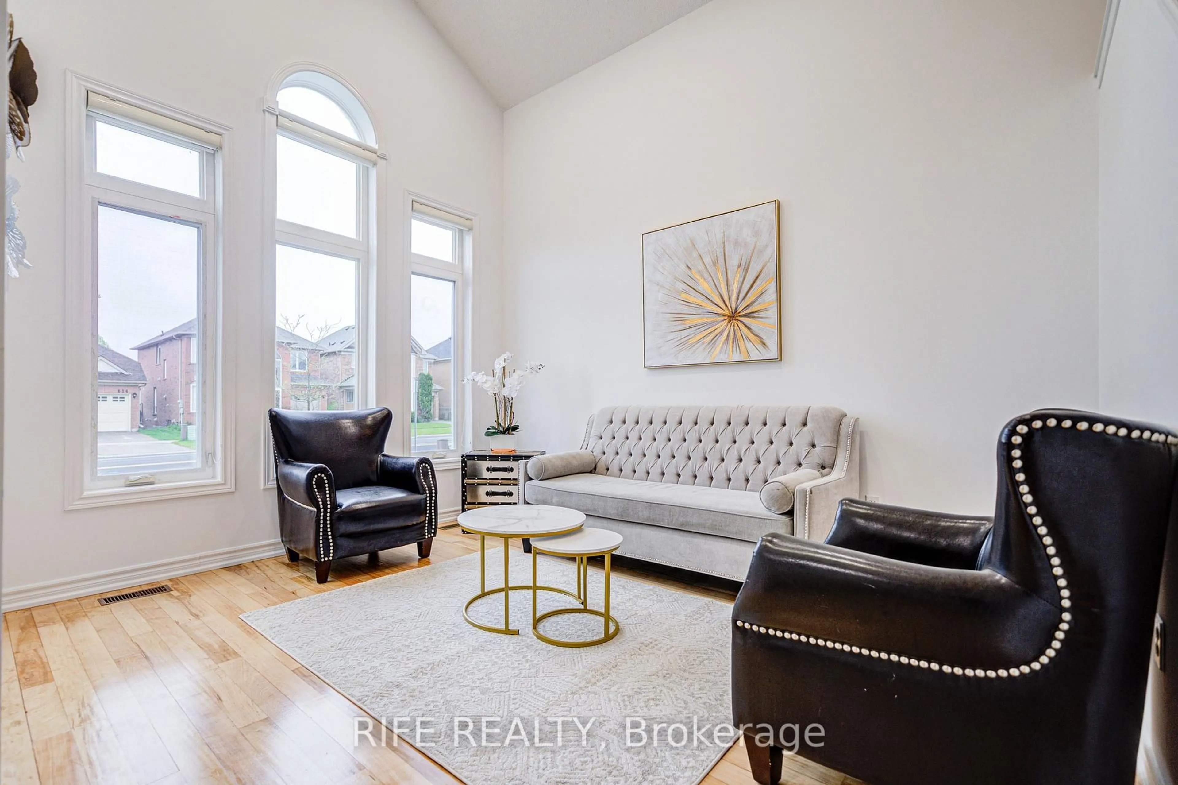 Living room with furniture, wood/laminate floor for 613 William Berczy Blvd, Markham Ontario L6C 2B6