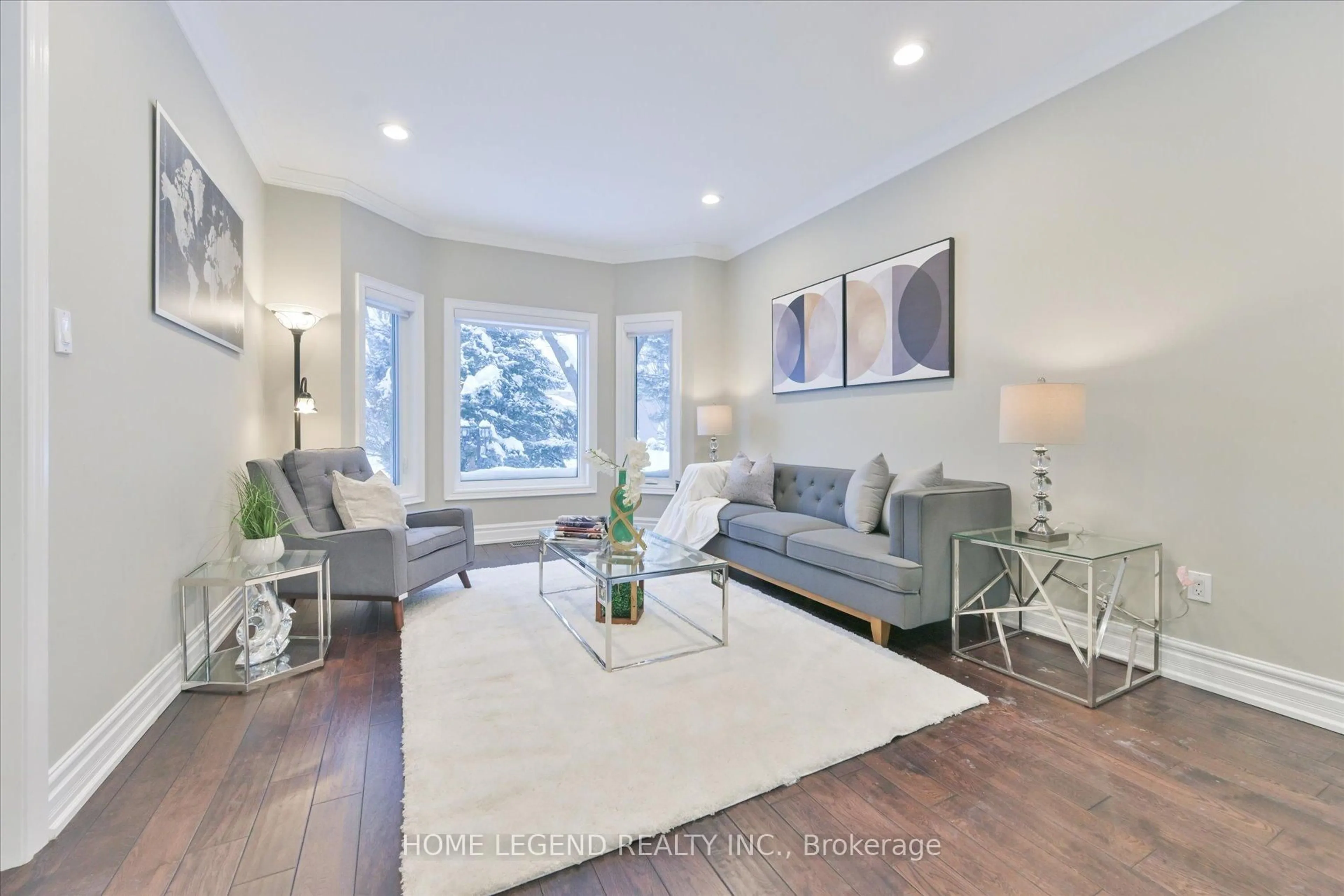 Living room with furniture, wood/laminate floor for 25 Vandermeer Dr, Markham Ontario L6C 2L2