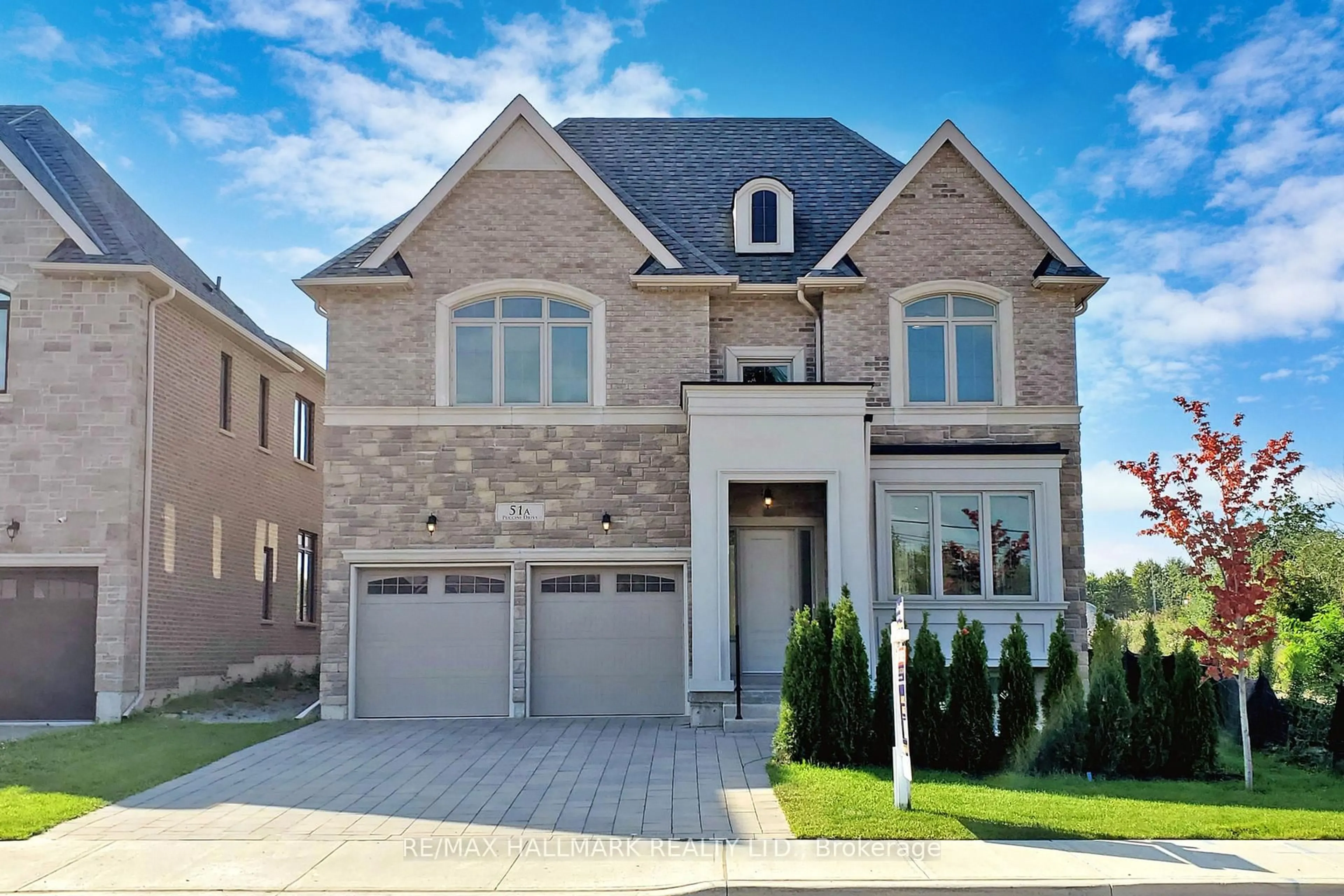 Home with brick exterior material, street for 51A Puccini Dr, Richmond Hill Ontario L4E 2Y6