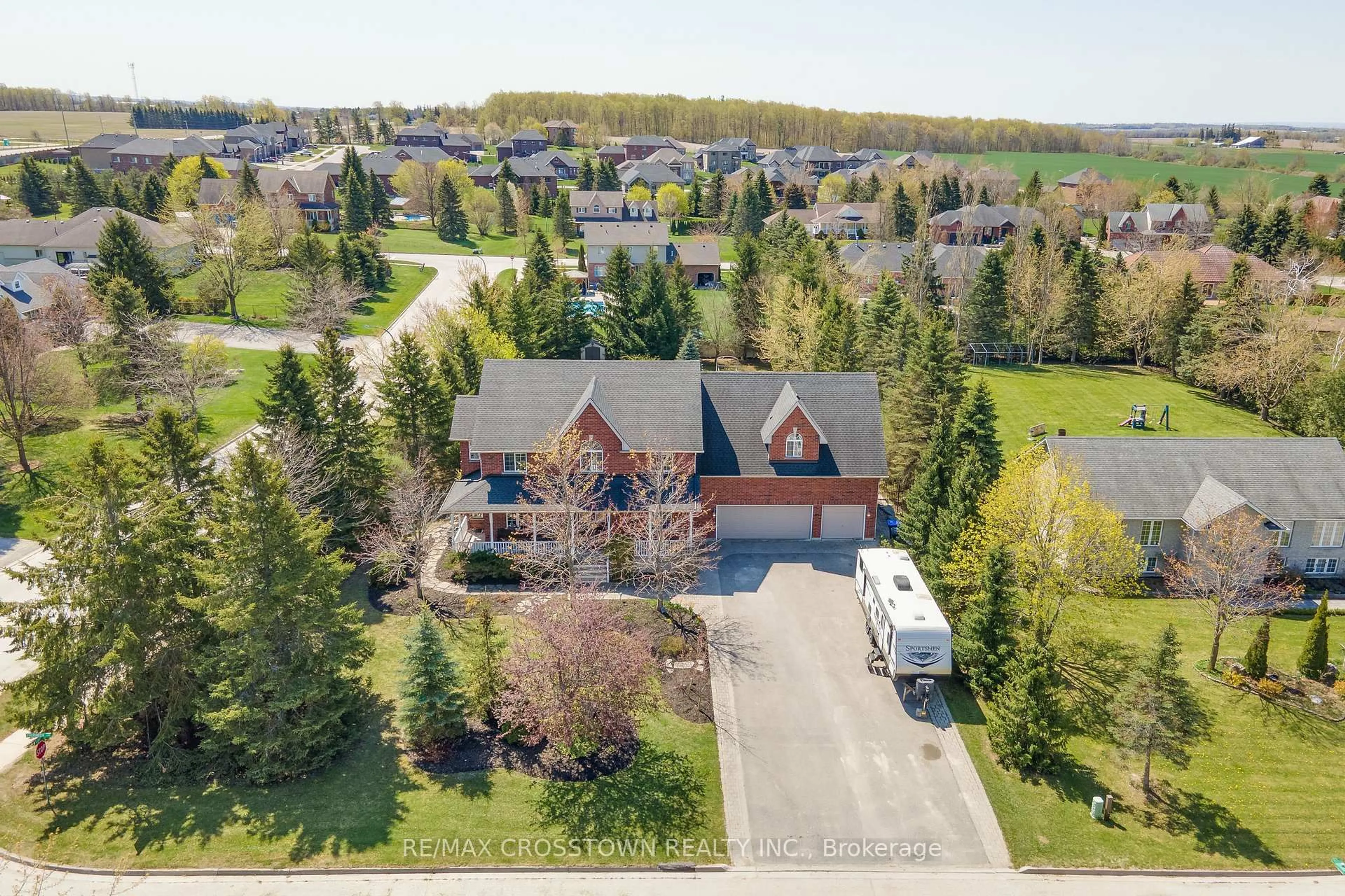 A pic from outside/outdoor area/front of a property/back of a property/a pic from drone, street for 2 Evergreen Lane, Essa Ontario L0L 2N0