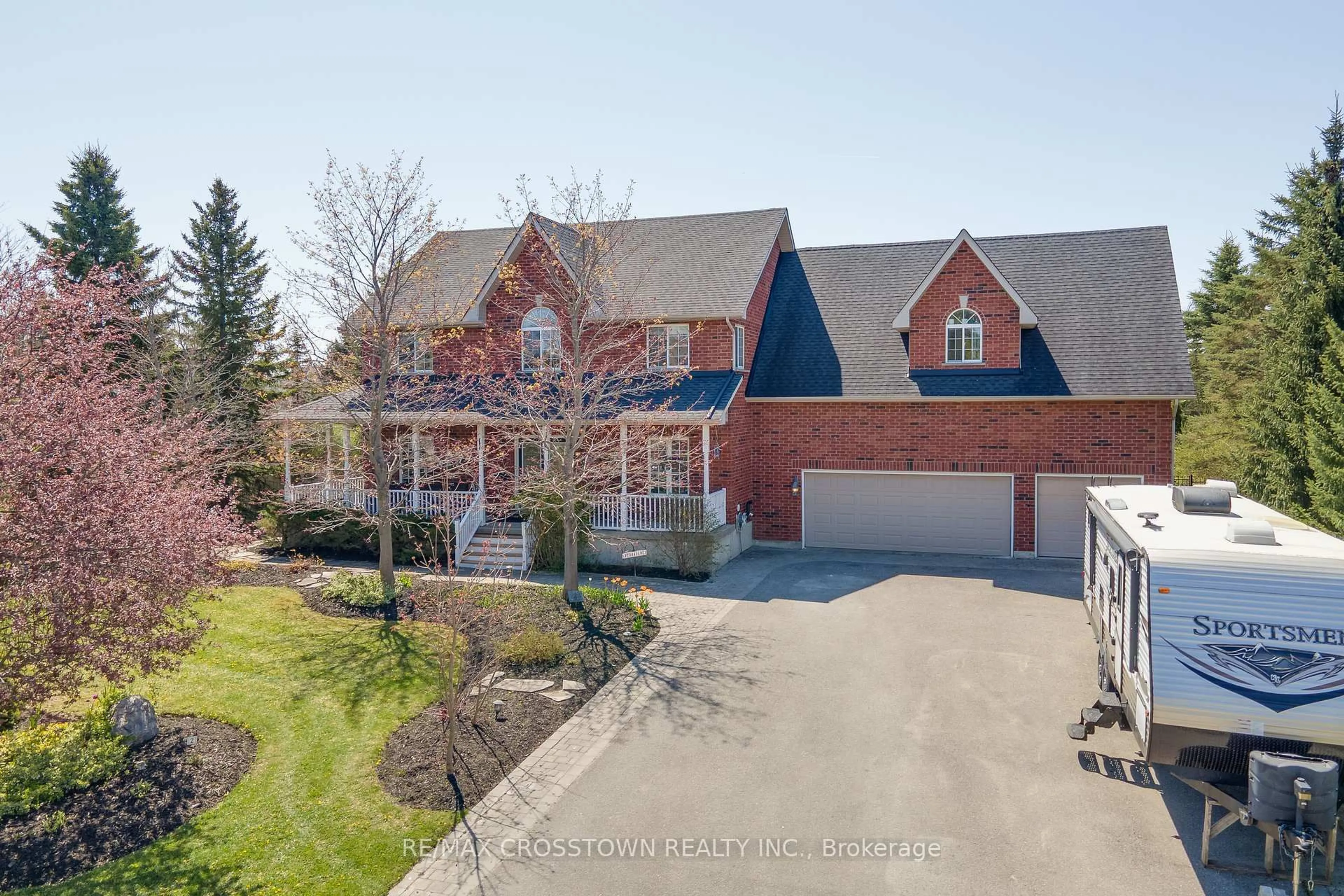 A pic from outside/outdoor area/front of a property/back of a property/a pic from drone, street for 2 Evergreen Lane, Essa Ontario L0L 2N0