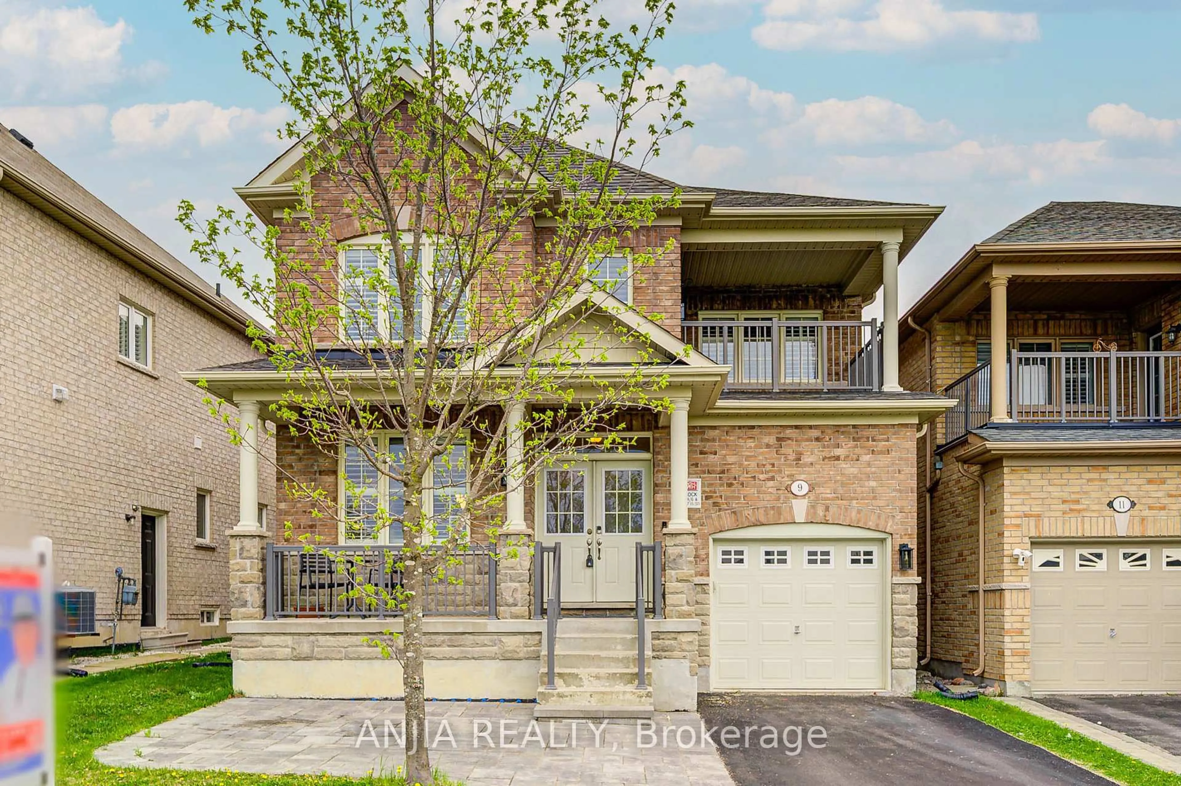 Home with brick exterior material, street for 9 Desjardin Dr, Markham Ontario L6E 0K2