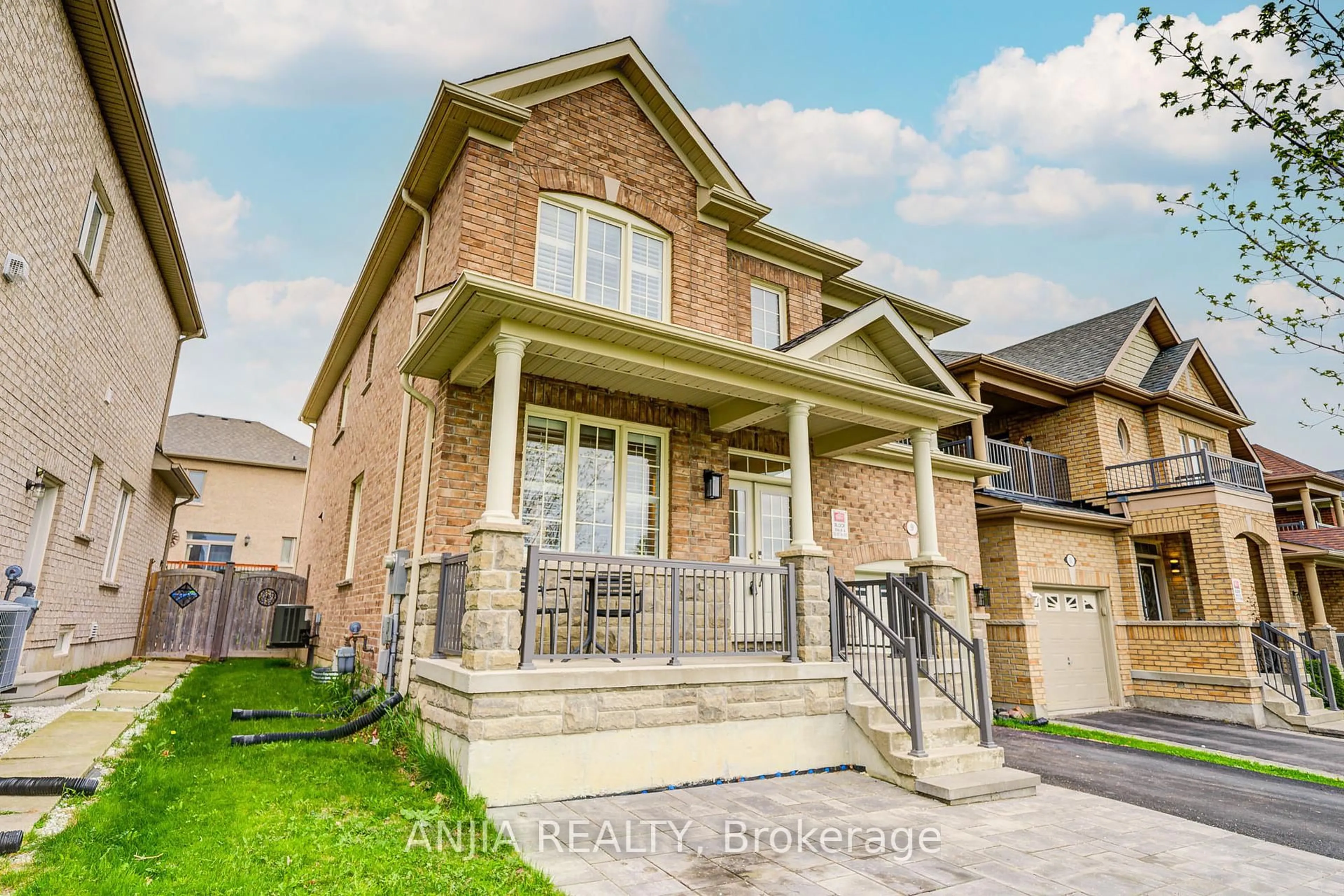 Home with brick exterior material, street for 9 Desjardin Dr, Markham Ontario L6E 0K2
