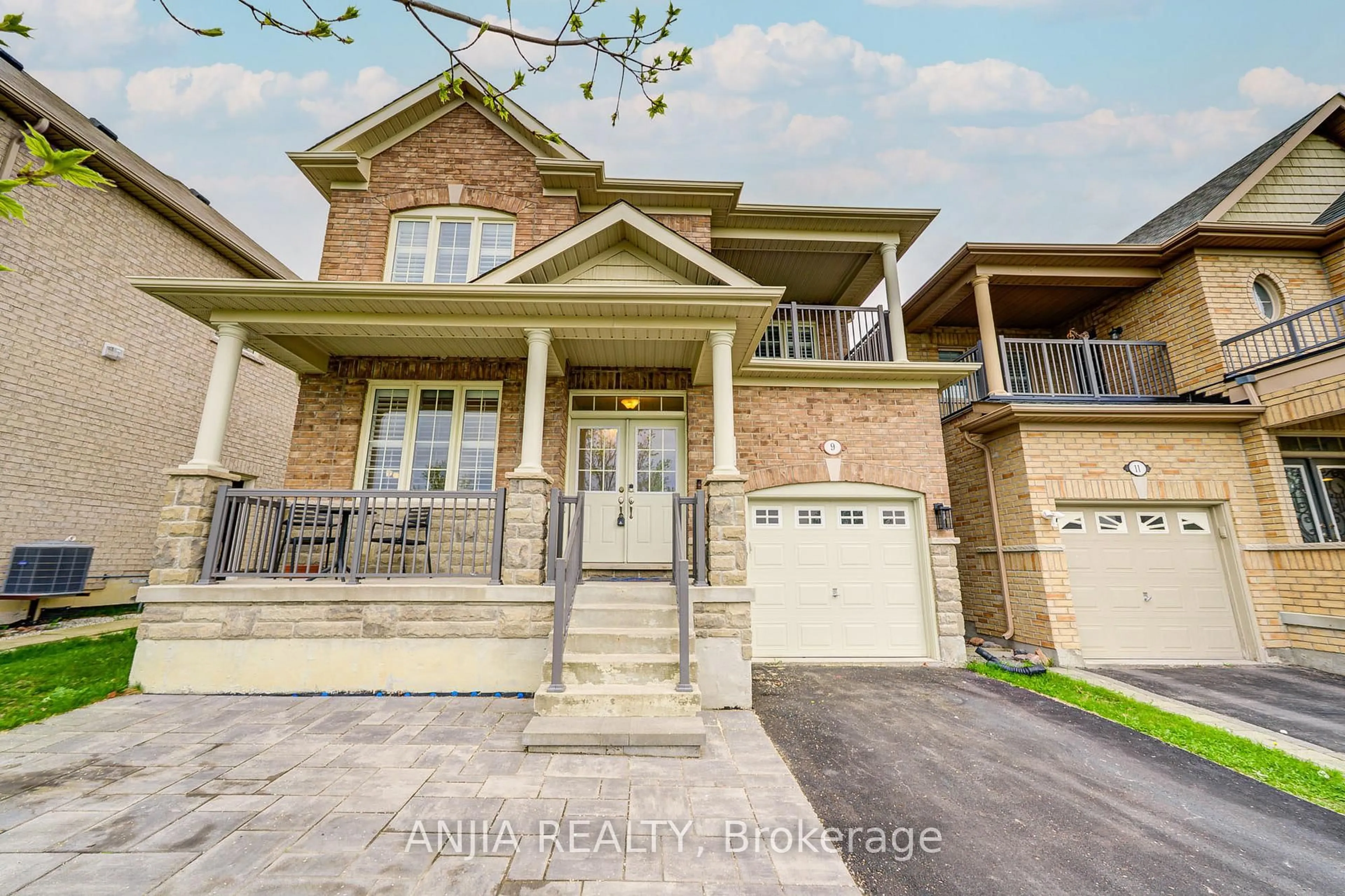 Home with brick exterior material, street for 9 Desjardin Dr, Markham Ontario L6E 0K2
