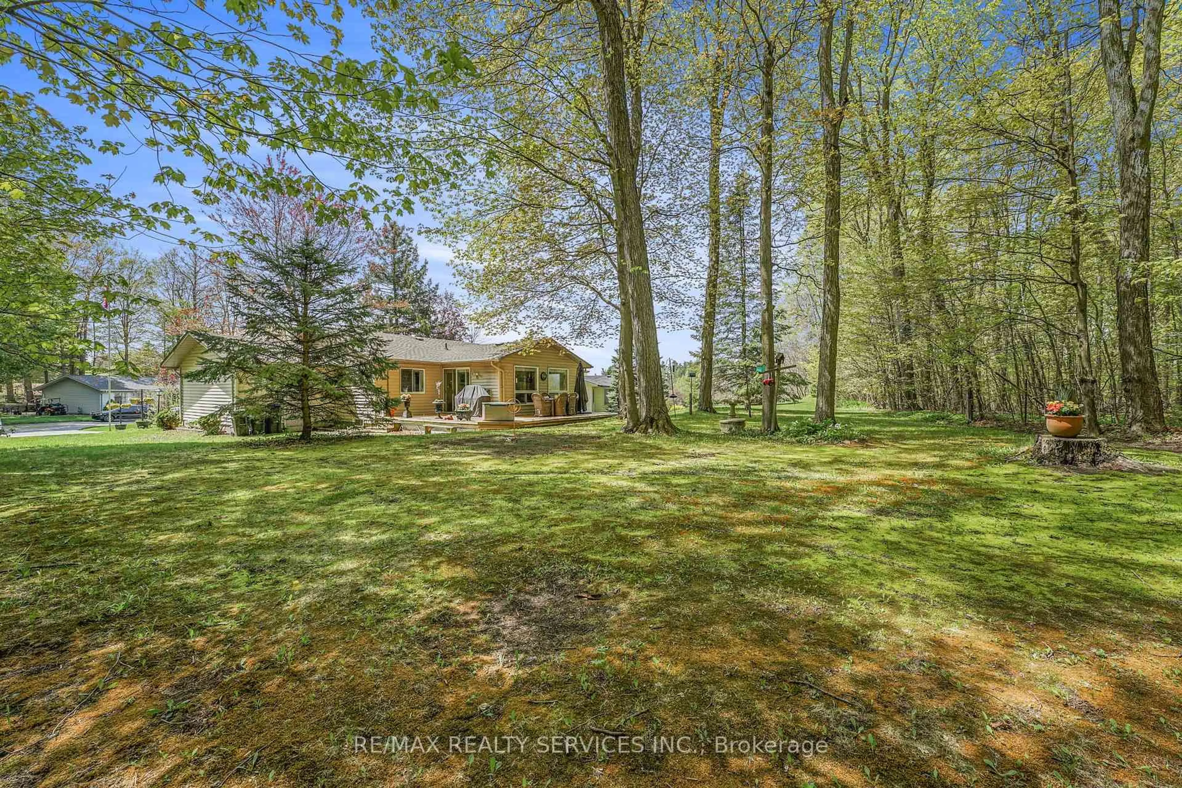A pic from outside/outdoor area/front of a property/back of a property/a pic from drone, forest/trees view for 12 Pinetree Crt, New Tecumseth Ontario L0G 1W0