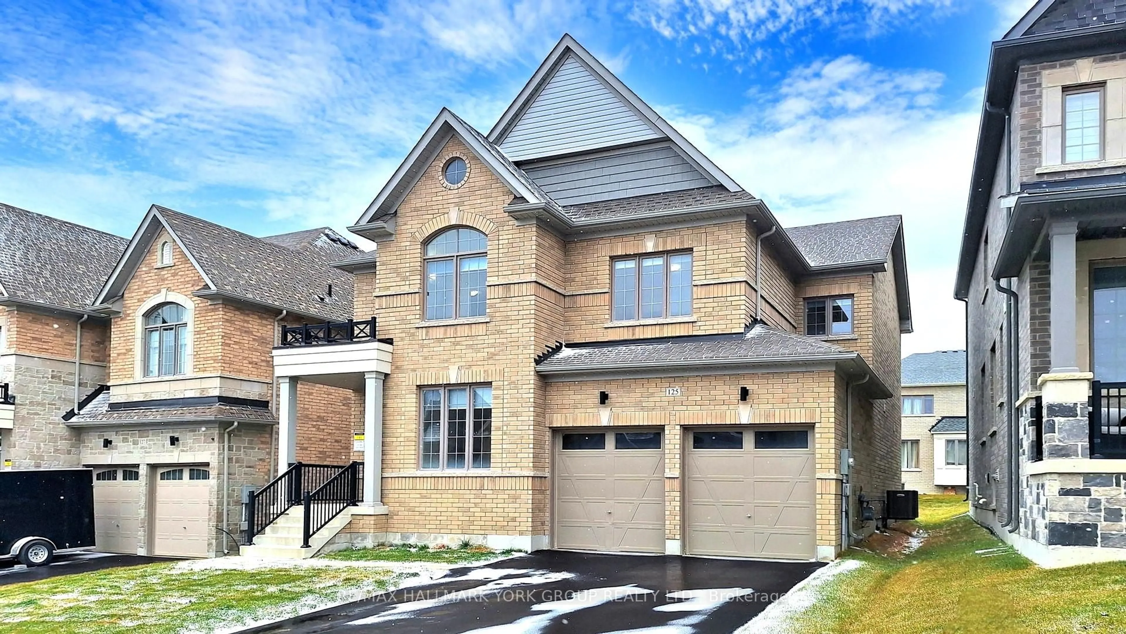 Home with brick exterior material, street for 125 Silk Twist Dr, East Gwillimbury Ontario L9N 0W1