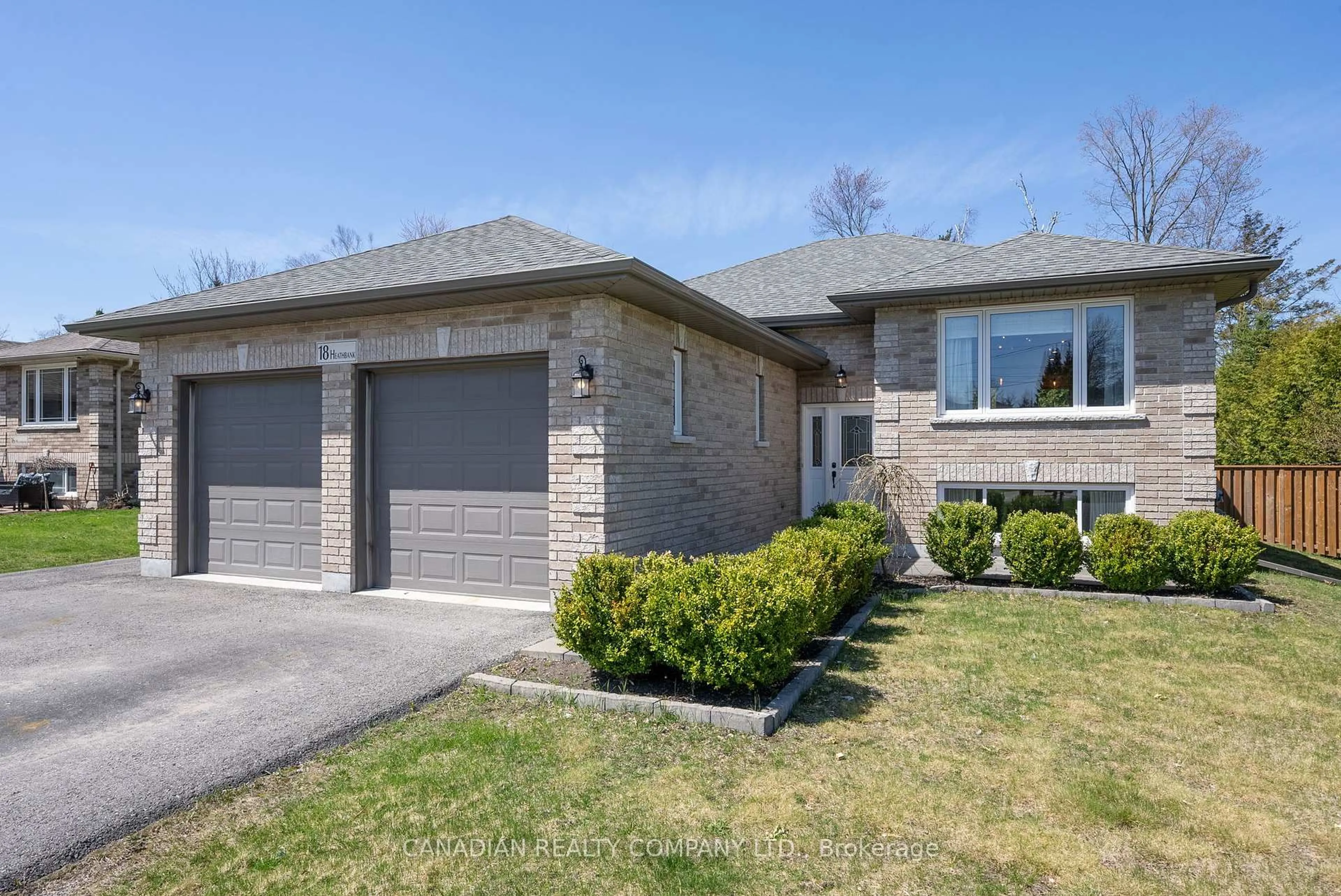 Home with brick exterior material, street for 18 Heathbank Ave, Georgina Ontario L0E 1N0