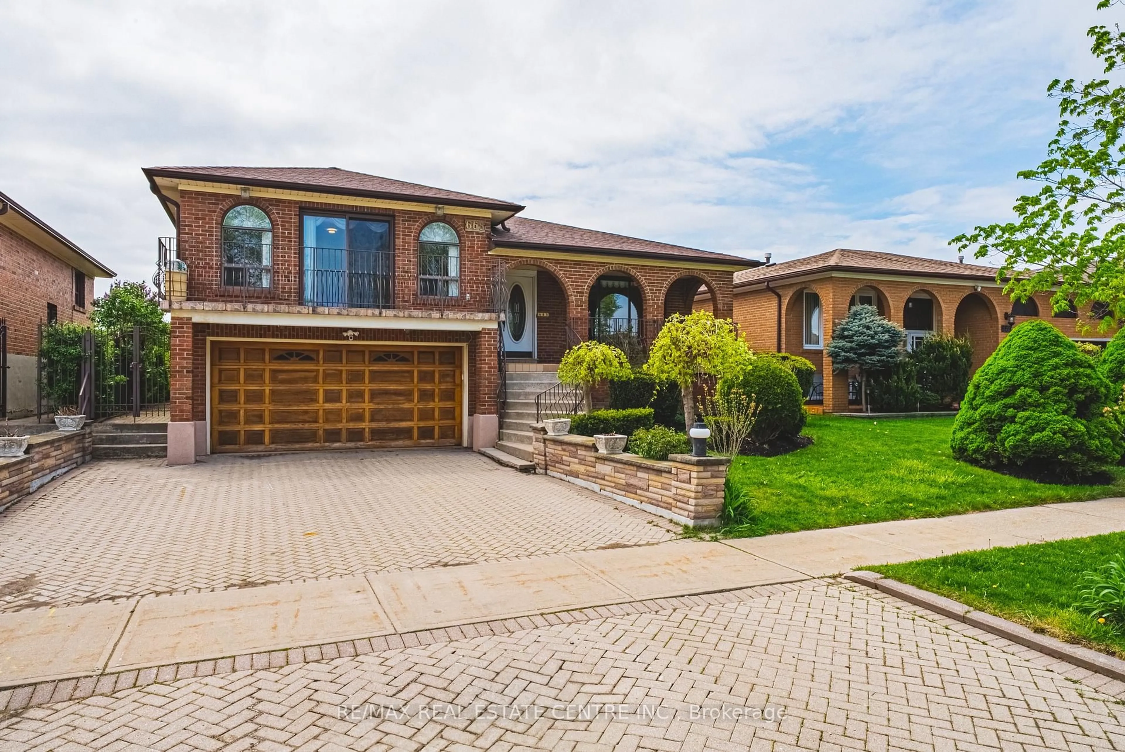 Home with brick exterior material, street for 665 Woodbridge Ave, Vaughan Ontario L4L 2T9
