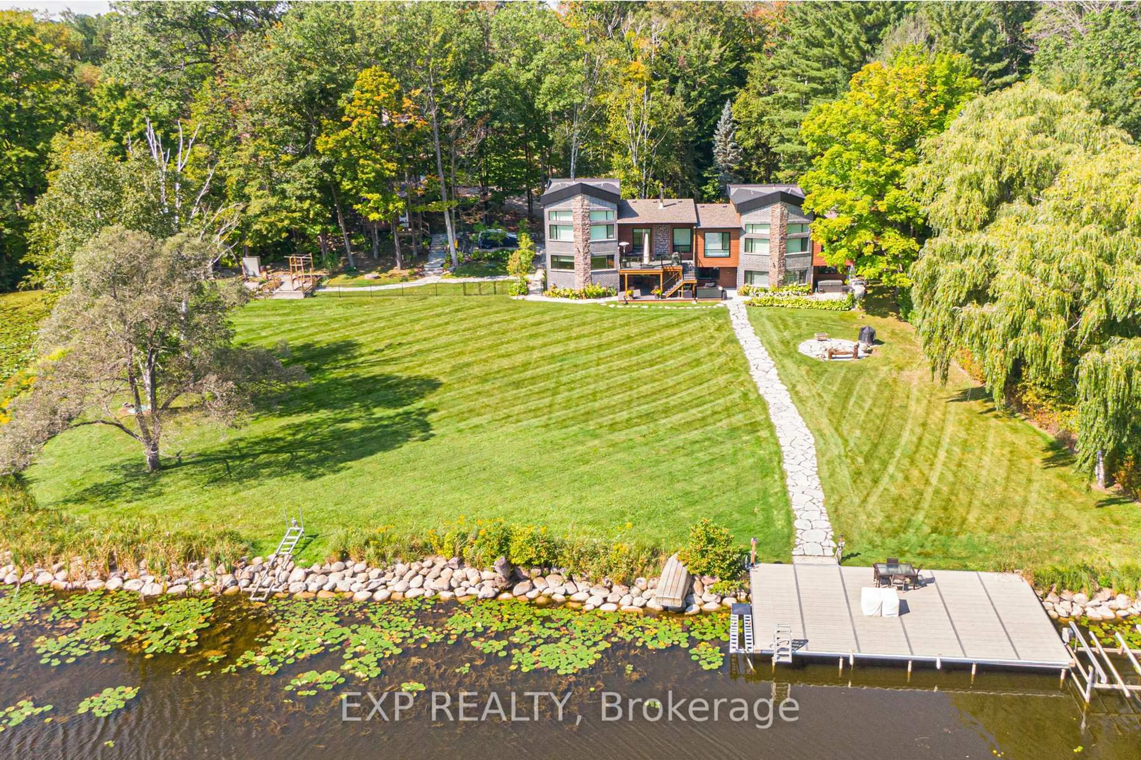 A pic from outside/outdoor area/front of a property/back of a property/a pic from drone, water/lake/river/ocean view for 5 Birch Knoll Rd, Georgina Ontario L0E 1R0
