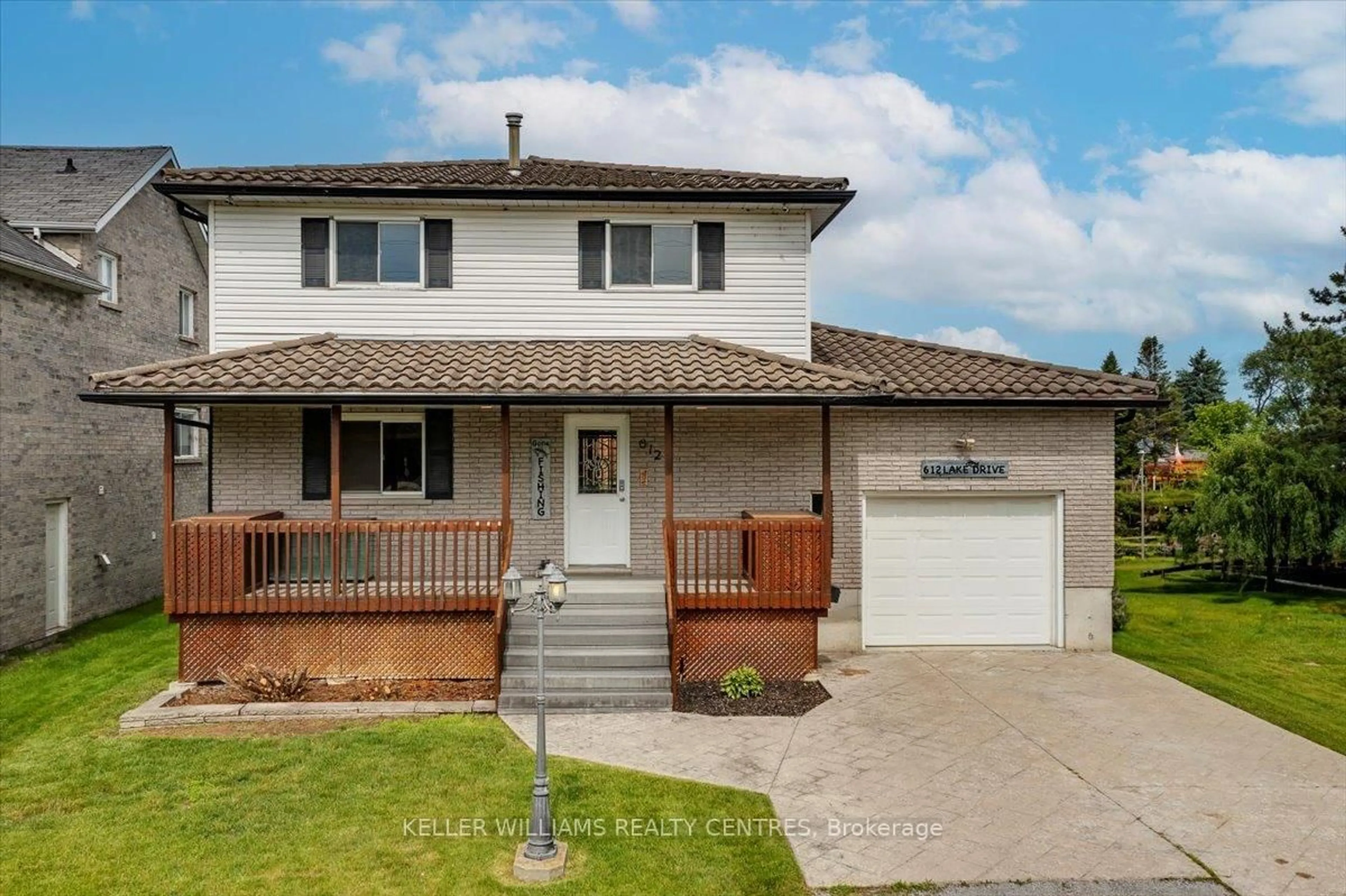 Home with vinyl exterior material, street for 612 Lake Dr, Georgina Ontario L4P 1T5