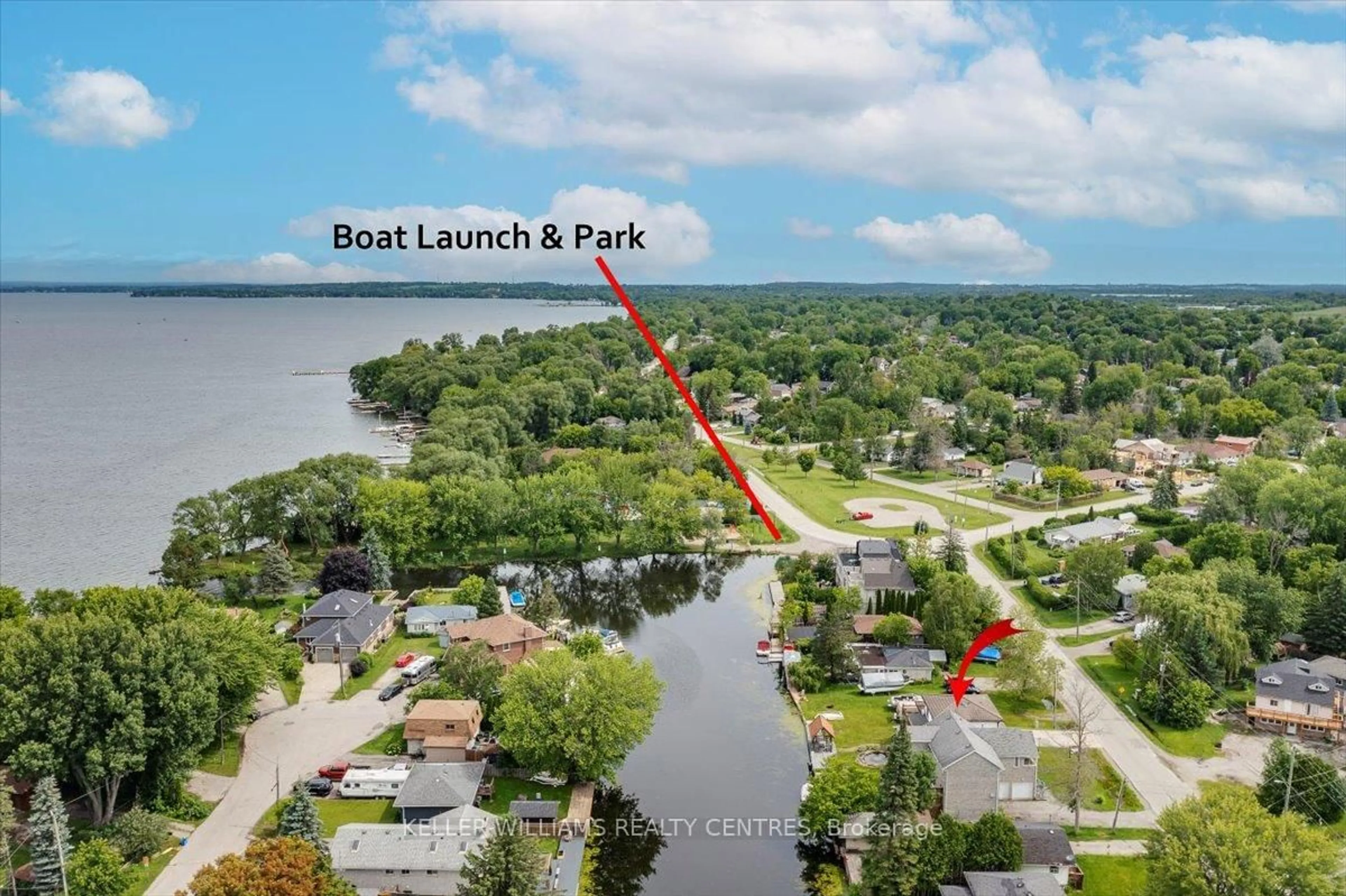 A pic from outside/outdoor area/front of a property/back of a property/a pic from drone, water/lake/river/ocean view for 612 Lake Dr, Georgina Ontario L4P 1T5