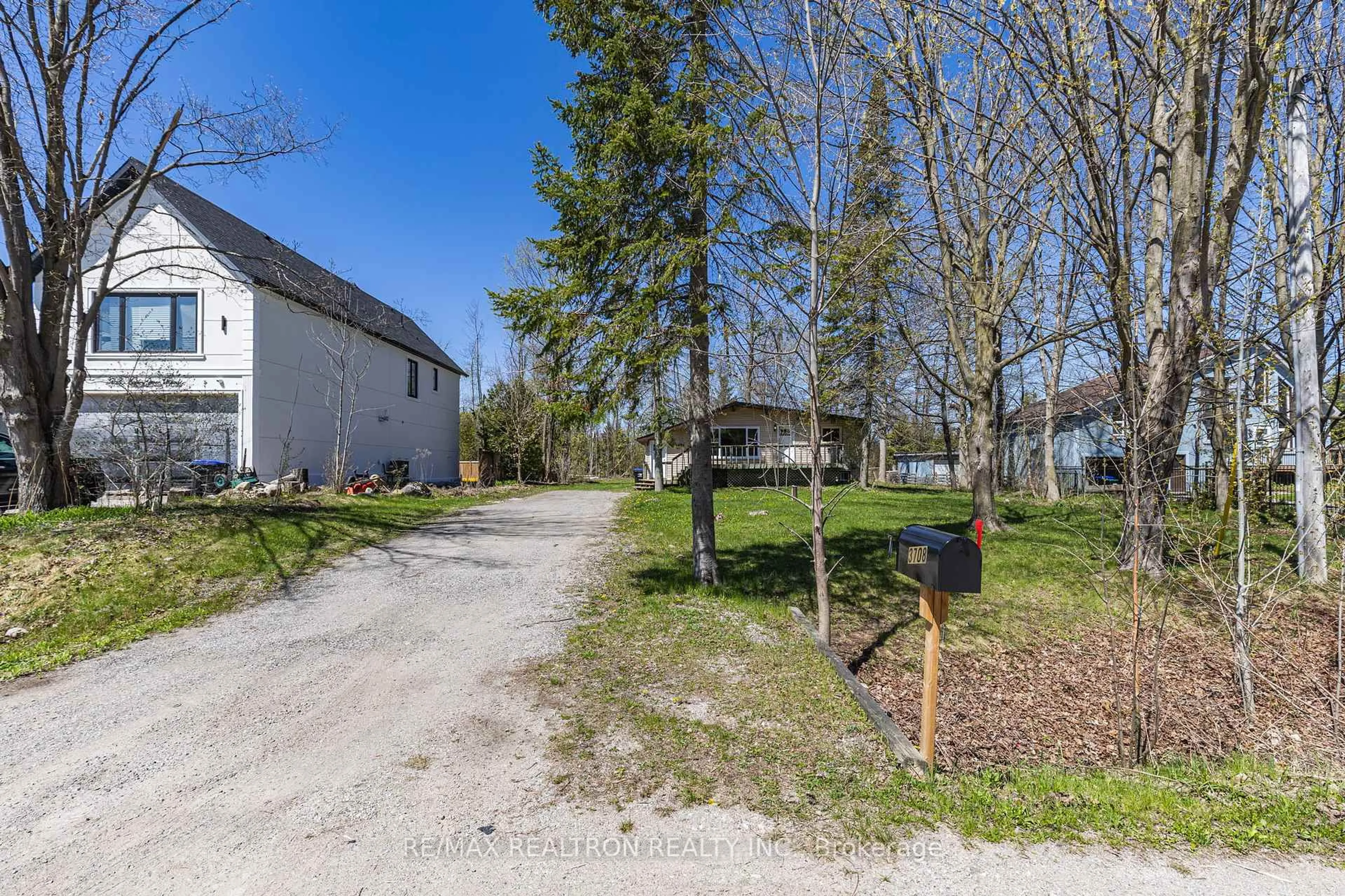 A pic from outside/outdoor area/front of a property/back of a property/a pic from drone, street for 3708 Maple Grove Rd, Innisfil Ontario L9S 3B3