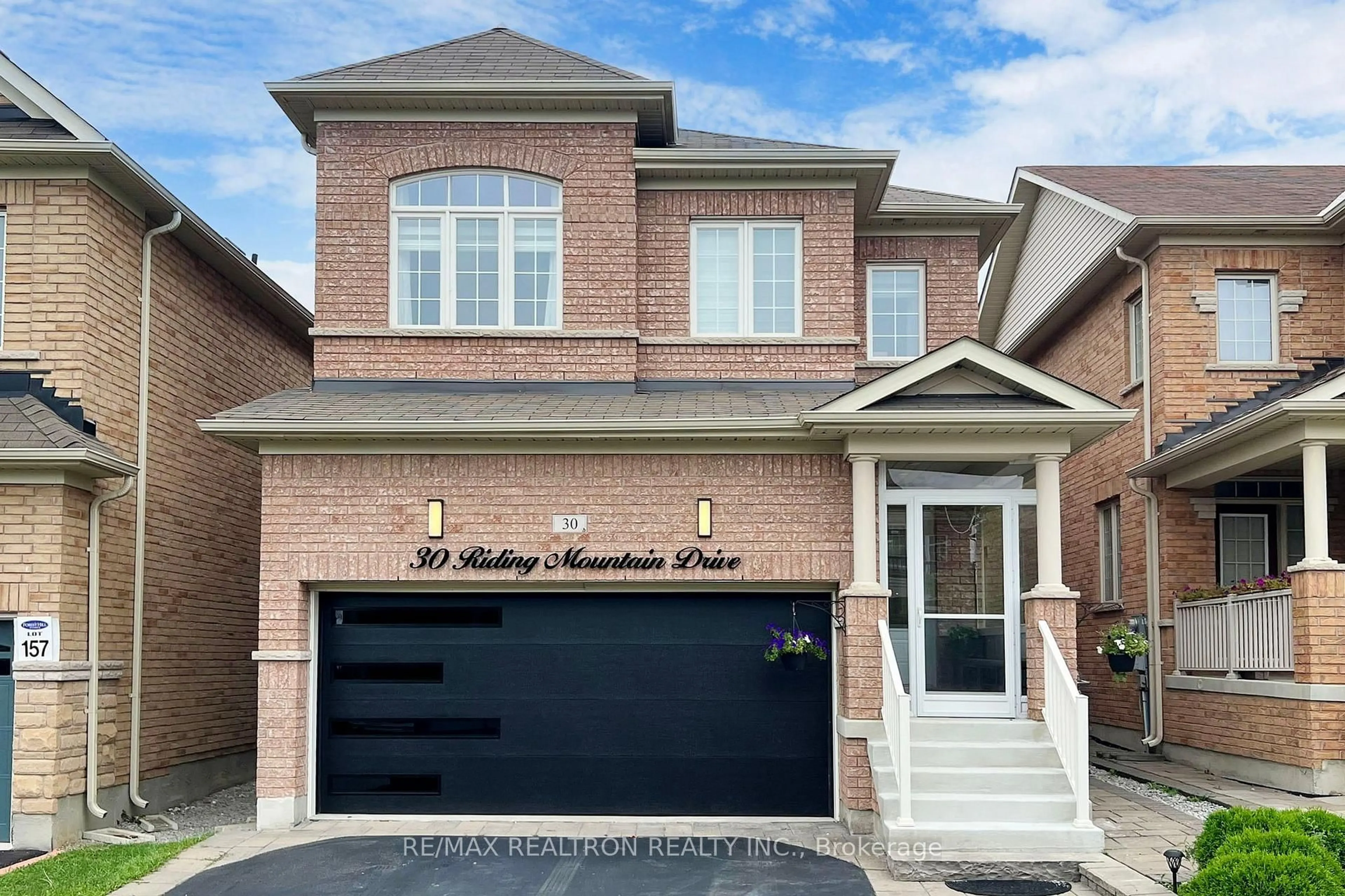 Home with brick exterior material, street for 30 Riding Mountain Dr, Richmond Hill Ontario L4E 0V4