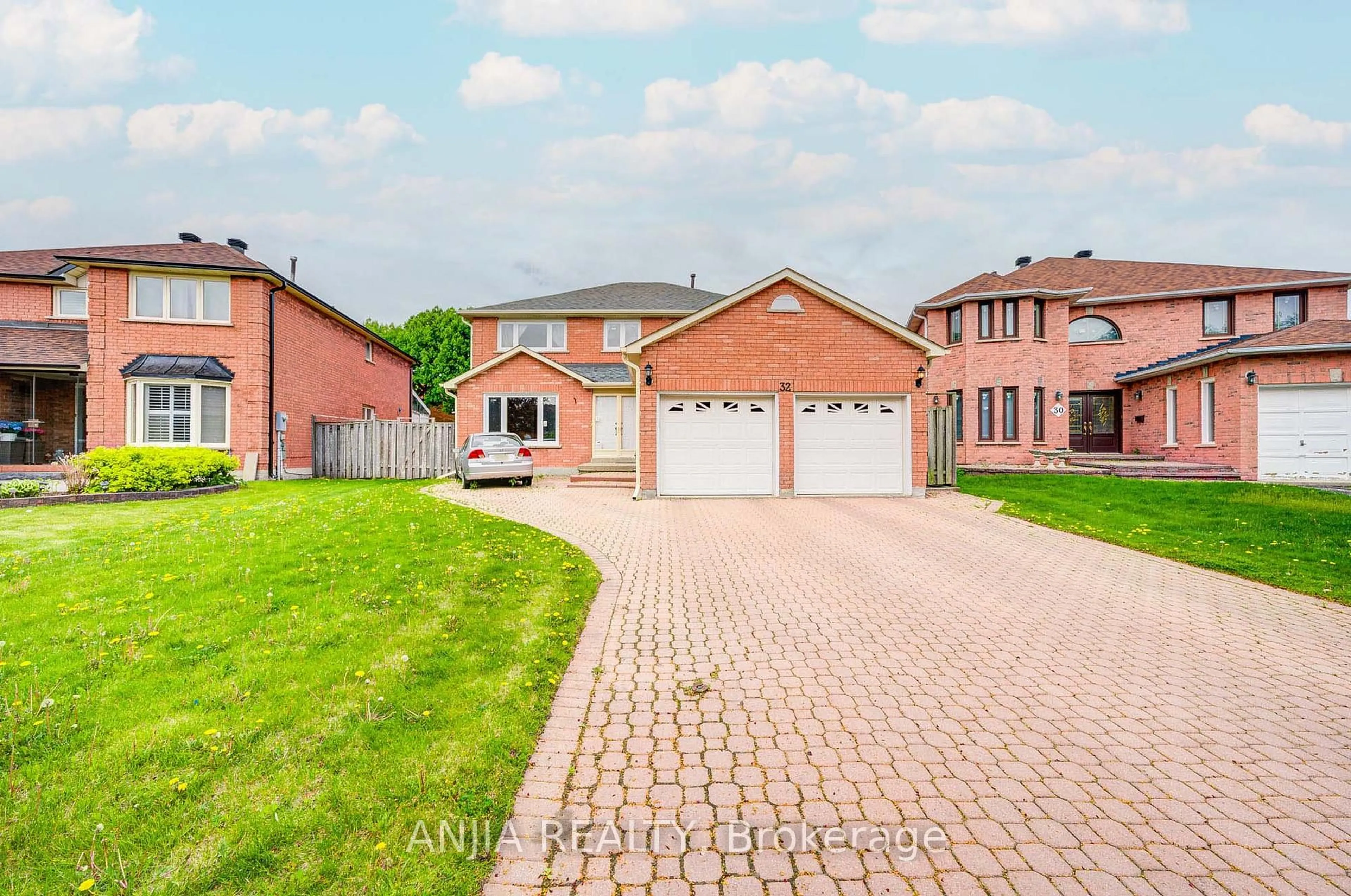 Home with brick exterior material, street for 32 Brackin Rd, Markham Ontario L3R 6S1