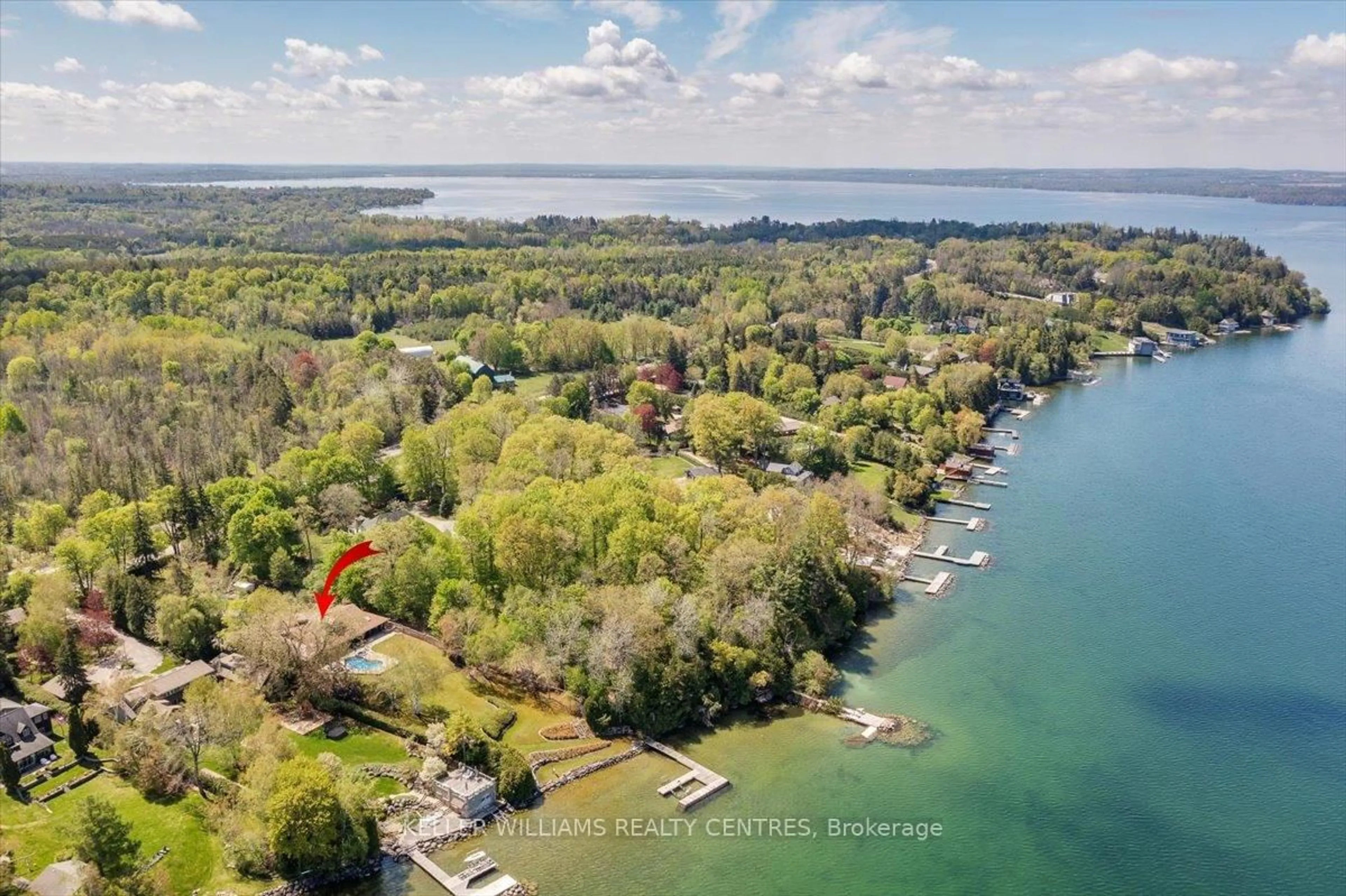 A pic from outside/outdoor area/front of a property/back of a property/a pic from drone, water/lake/river/ocean view for 700 Lake Dr, Georgina Ontario L4P 3C8
