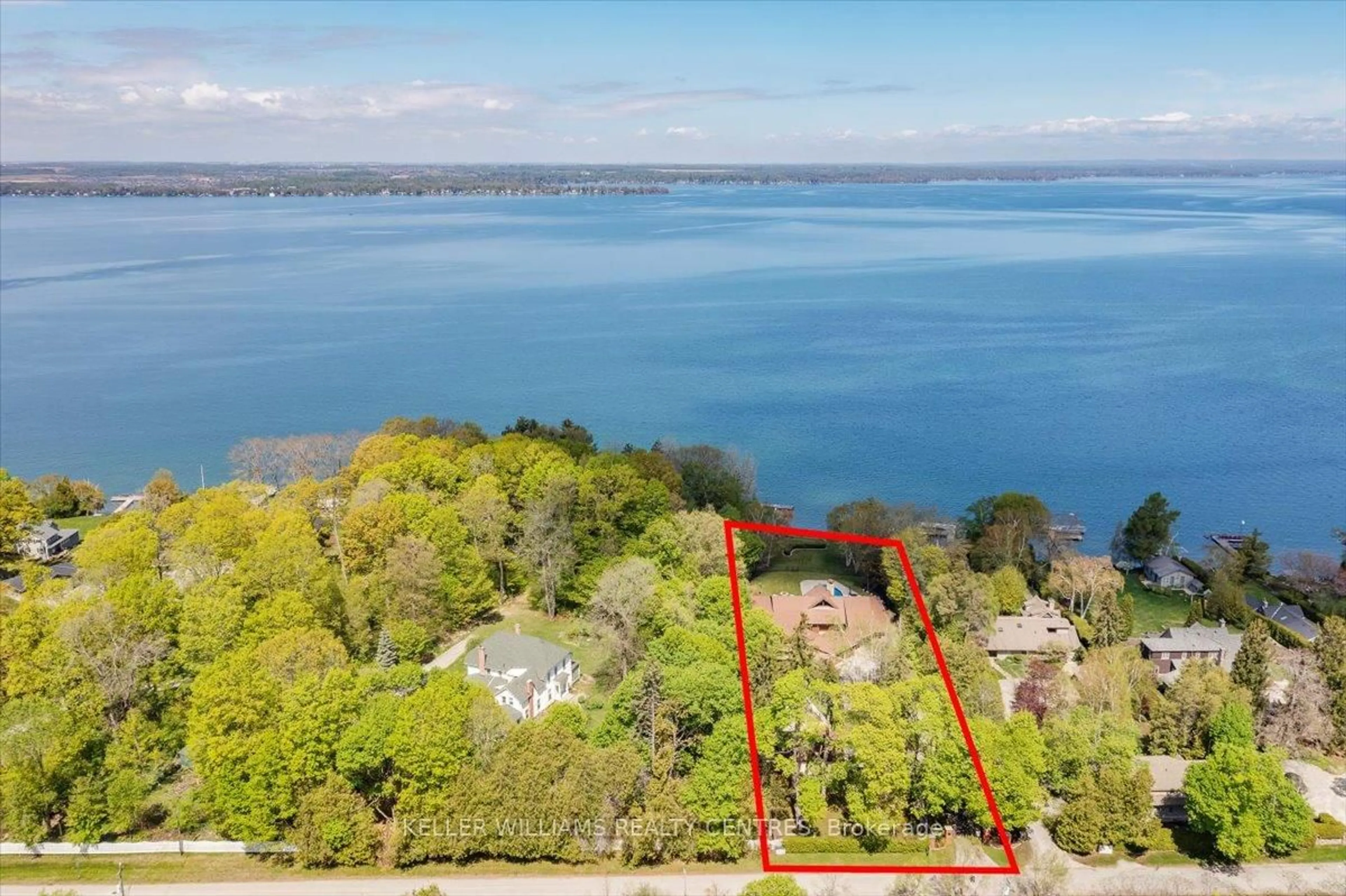 A pic from outside/outdoor area/front of a property/back of a property/a pic from drone, water/lake/river/ocean view for 700 Lake Dr, Georgina Ontario L4P 3C8