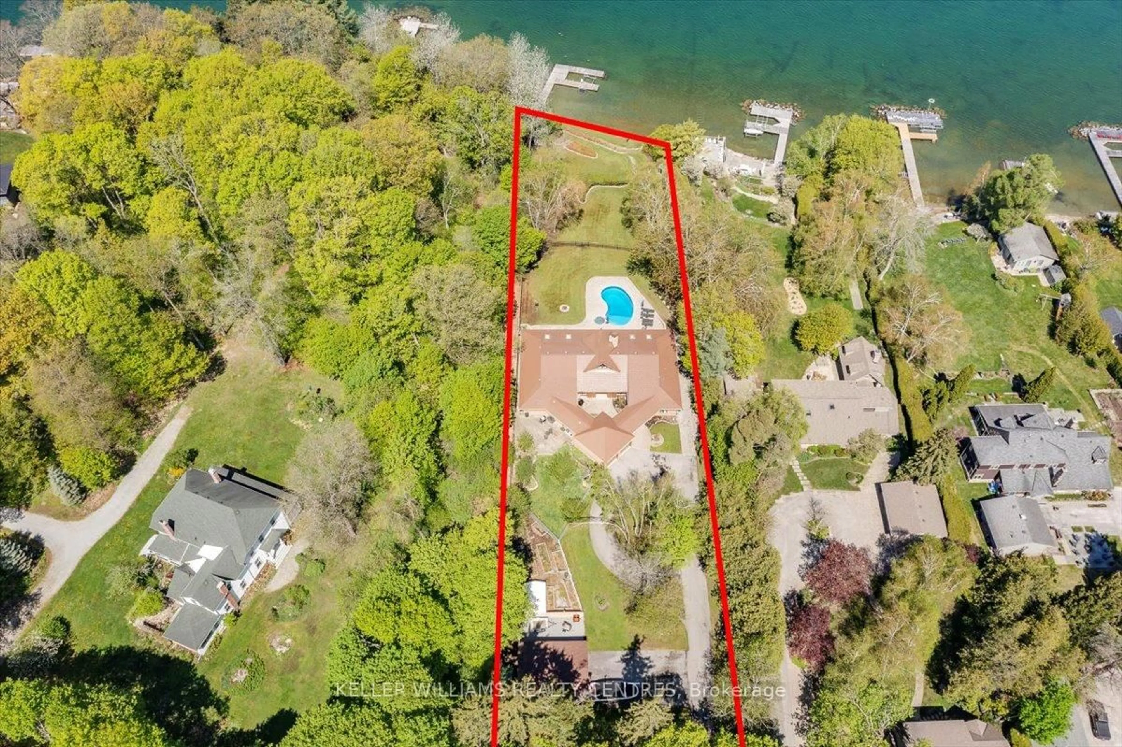 A pic from outside/outdoor area/front of a property/back of a property/a pic from drone, water/lake/river/ocean view for 700 Lake Dr, Georgina Ontario L4P 3C8