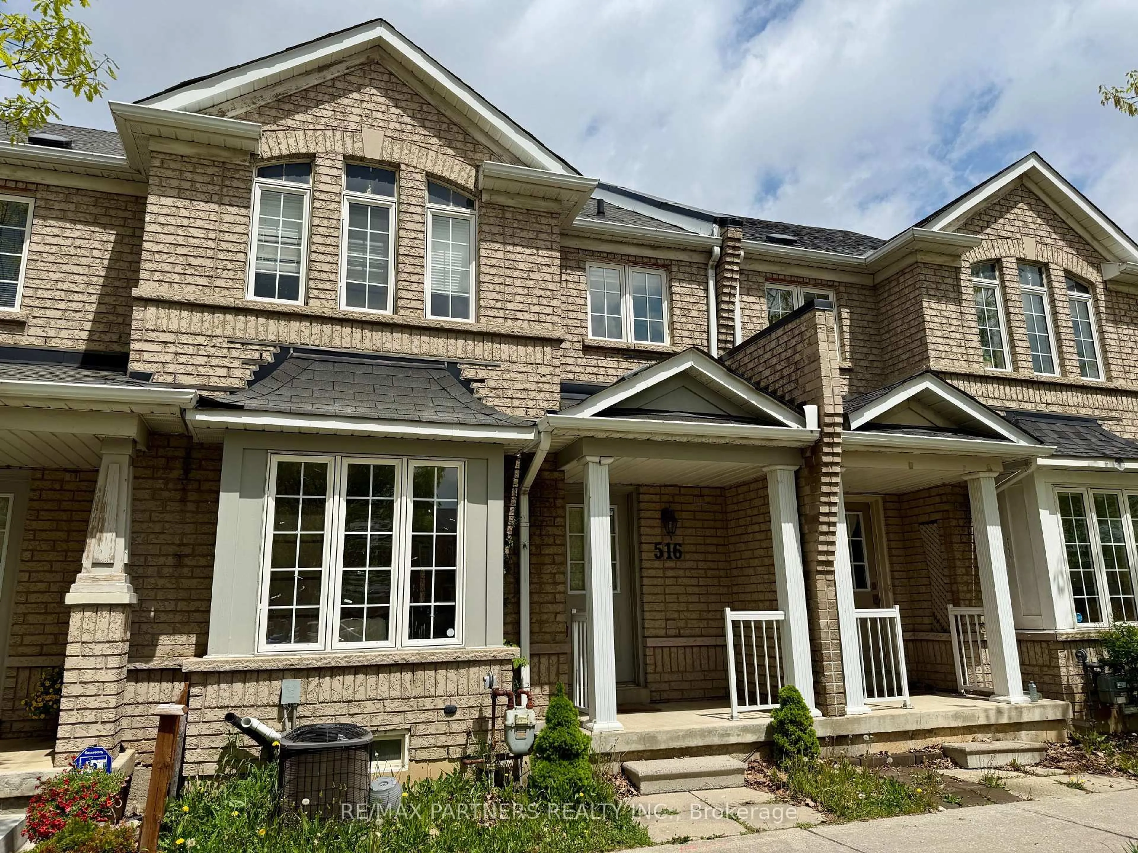 Home with brick exterior material, street for 516 Bur Oak Ave, Markham Ontario L6C 3A9