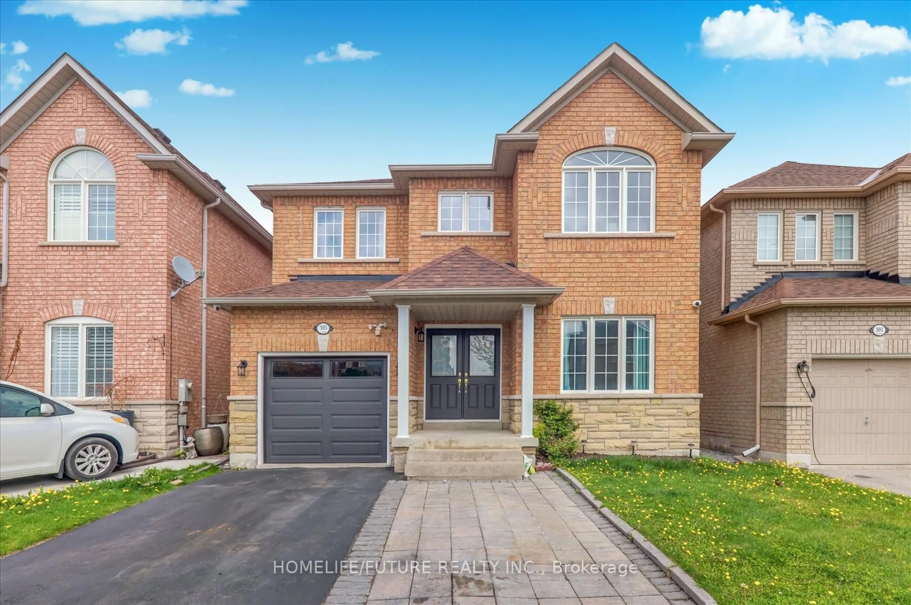Home with brick exterior material, street for 303 Williamson Rd, Markham Ontario L6E 2A7