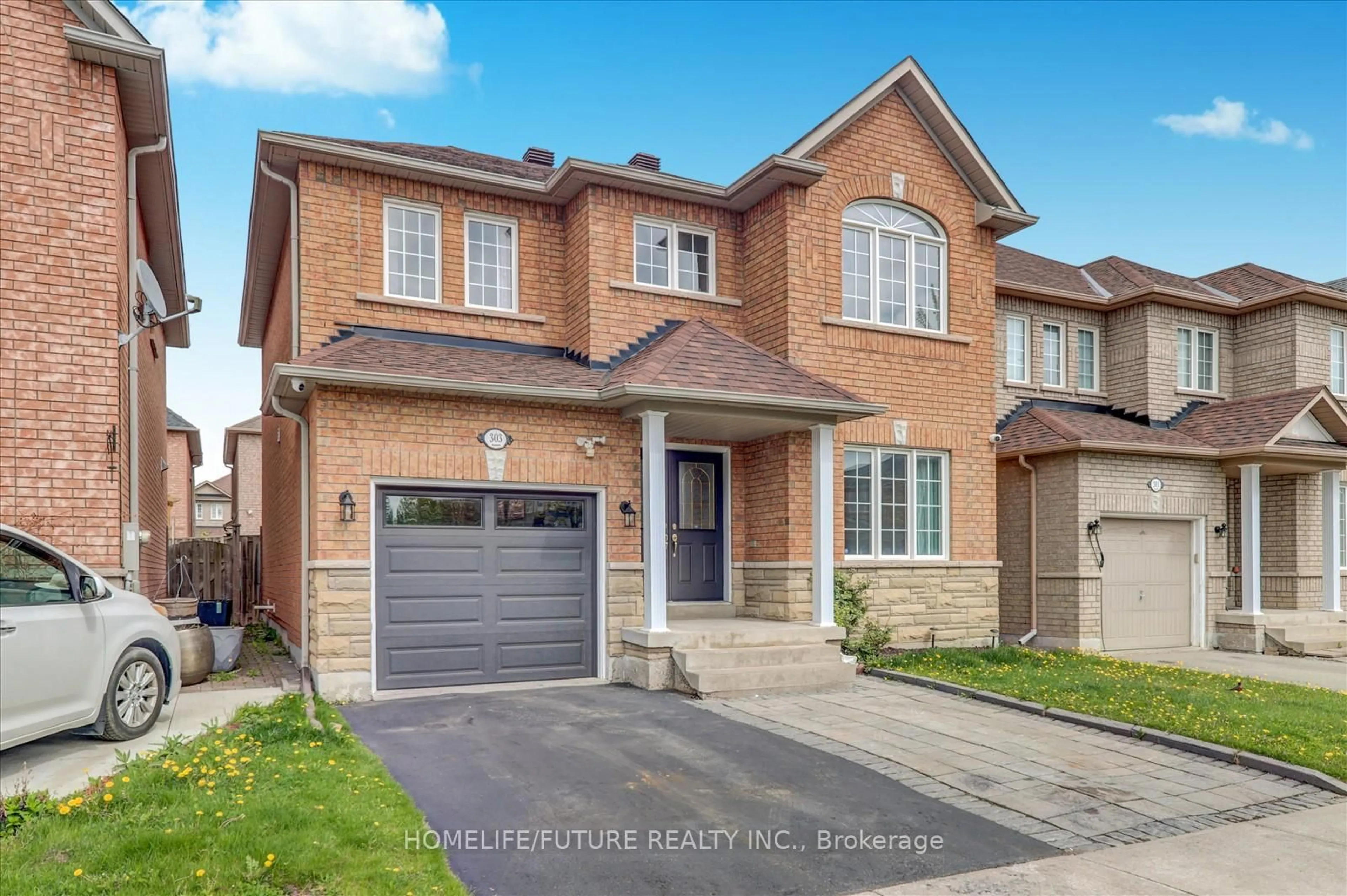 Home with brick exterior material, street for 303 Williamson Rd, Markham Ontario L6E 2A7