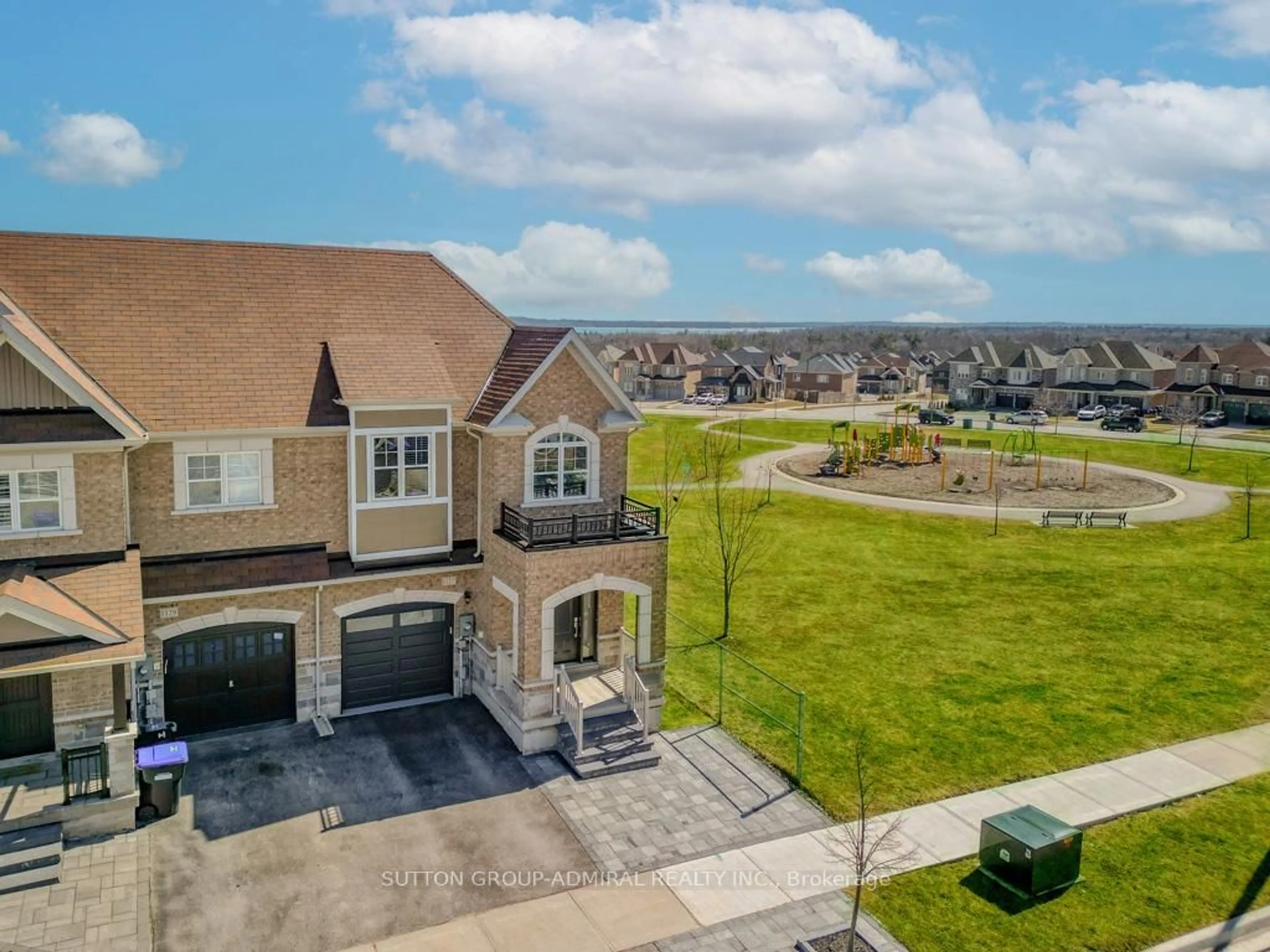 A pic from outside/outdoor area/front of a property/back of a property/a pic from drone, water/lake/river/ocean view for 1127 Wharram Way, Innisfil Ontario L0L 1W0