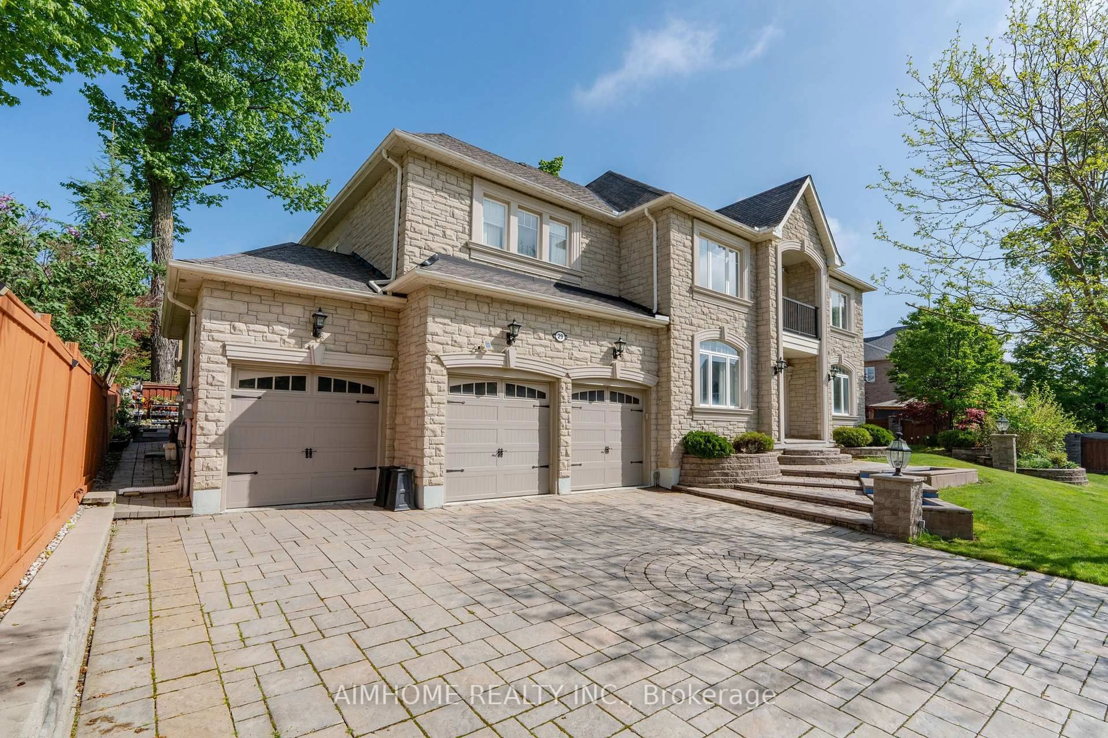 Home with brick exterior material, street for 29 Warden Woods Crt, Markham Ontario L3R 5W5