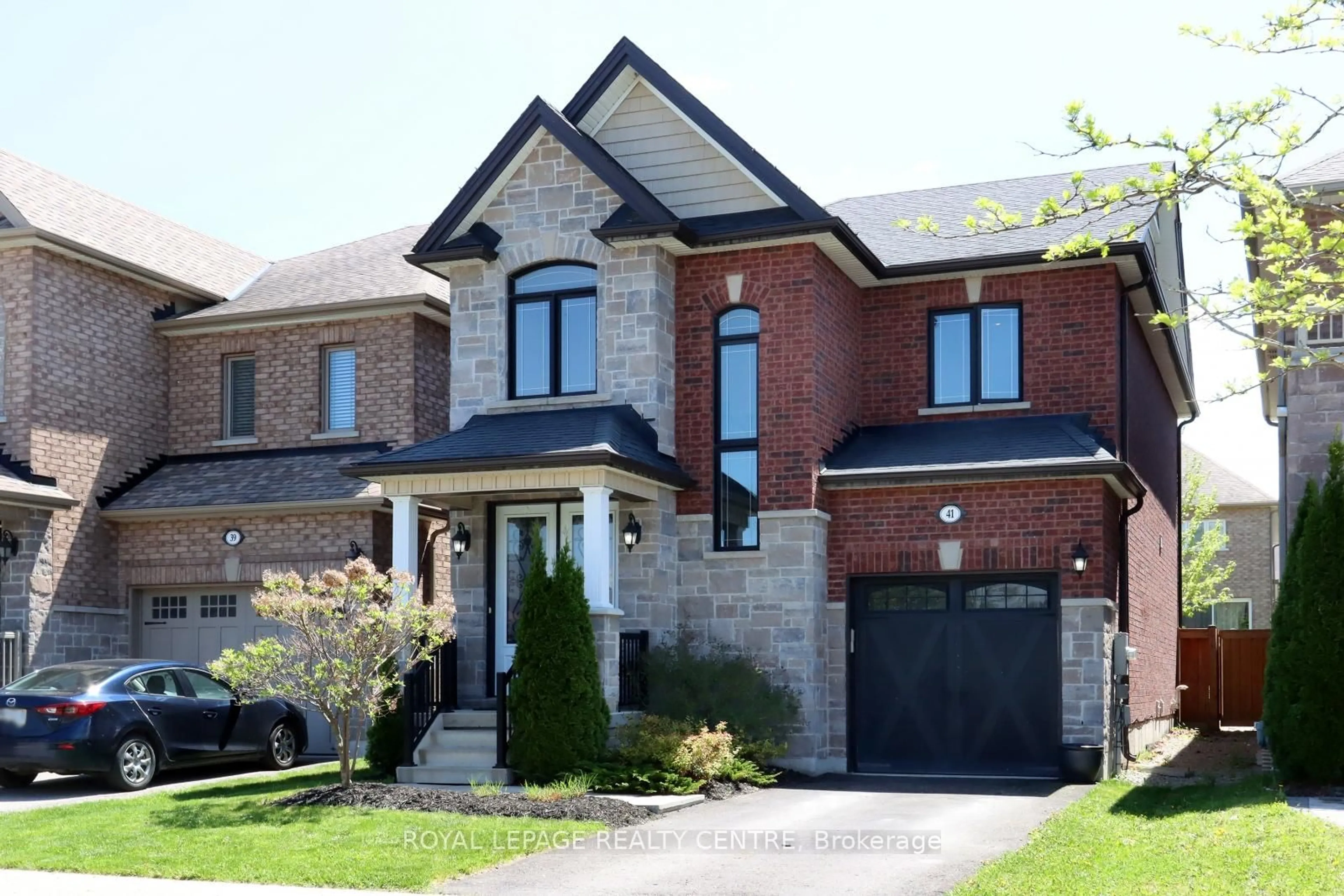Home with brick exterior material, street for 41 Holt Dr, New Tecumseth Ontario L9R 0H8