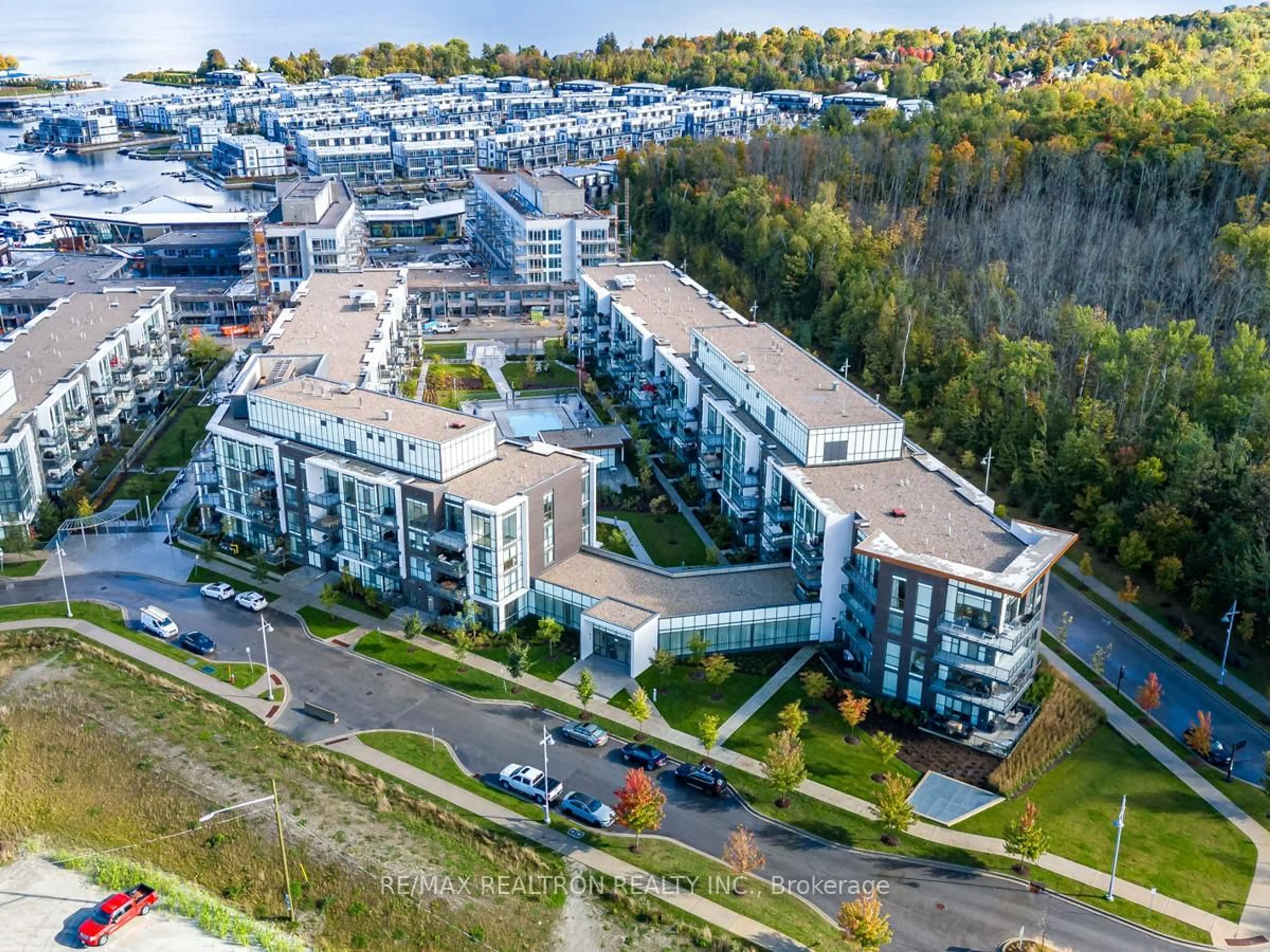 A pic from outside/outdoor area/front of a property/back of a property/a pic from drone, unknown for 415 Sea Ray Ave #410, Innisfil Ontario L9S 0R5
