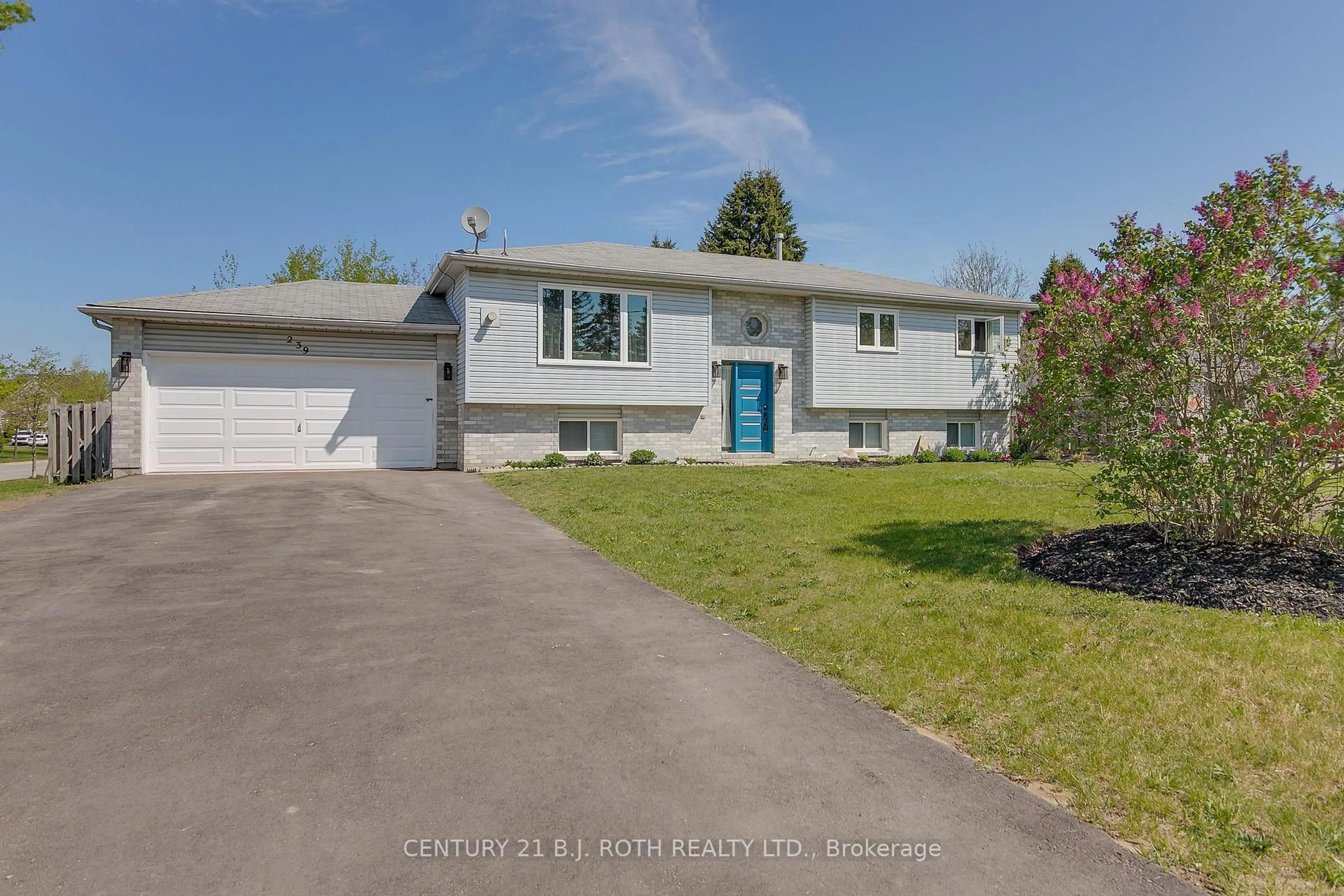 A pic from outside/outdoor area/front of a property/back of a property/a pic from drone, street for 239 Centre St, Essa Ontario L0M 1B0