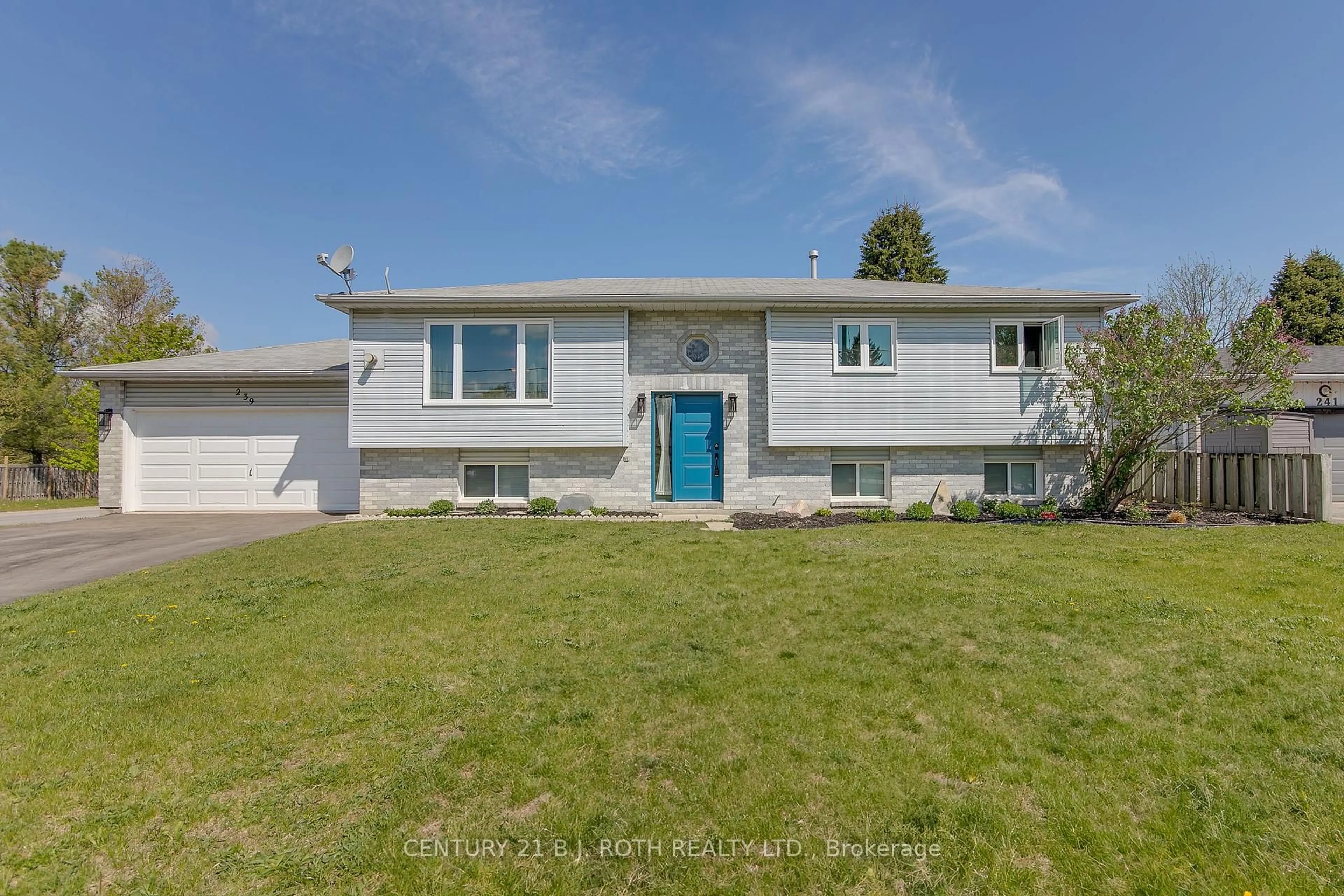 Home with vinyl exterior material, street for 239 Centre St, Essa Ontario L0M 1B0