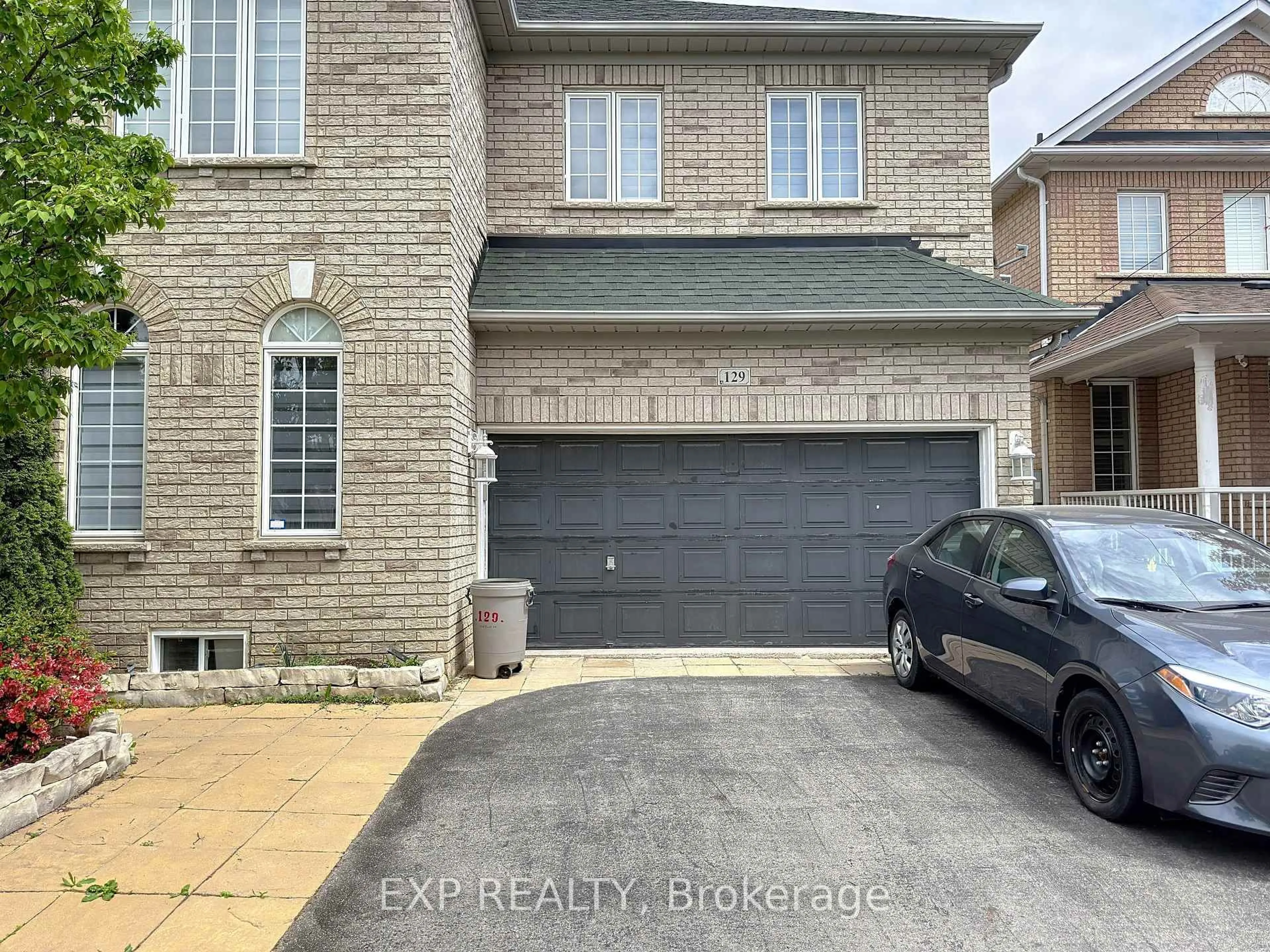 Home with brick exterior material, street for 129 Ledgerock Dr, Vaughan Ontario L4H 2G7