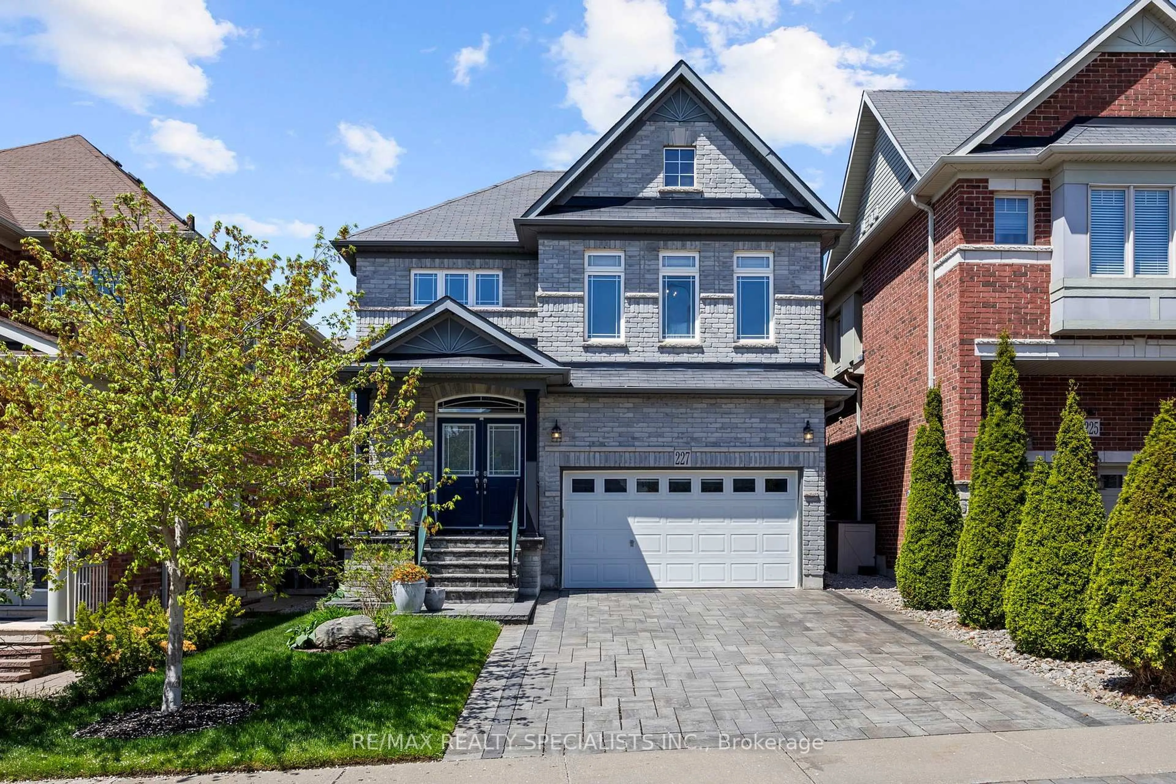 Home with brick exterior material, street for 227 Aspenwood Dr, Newmarket Ontario L3K 3K7