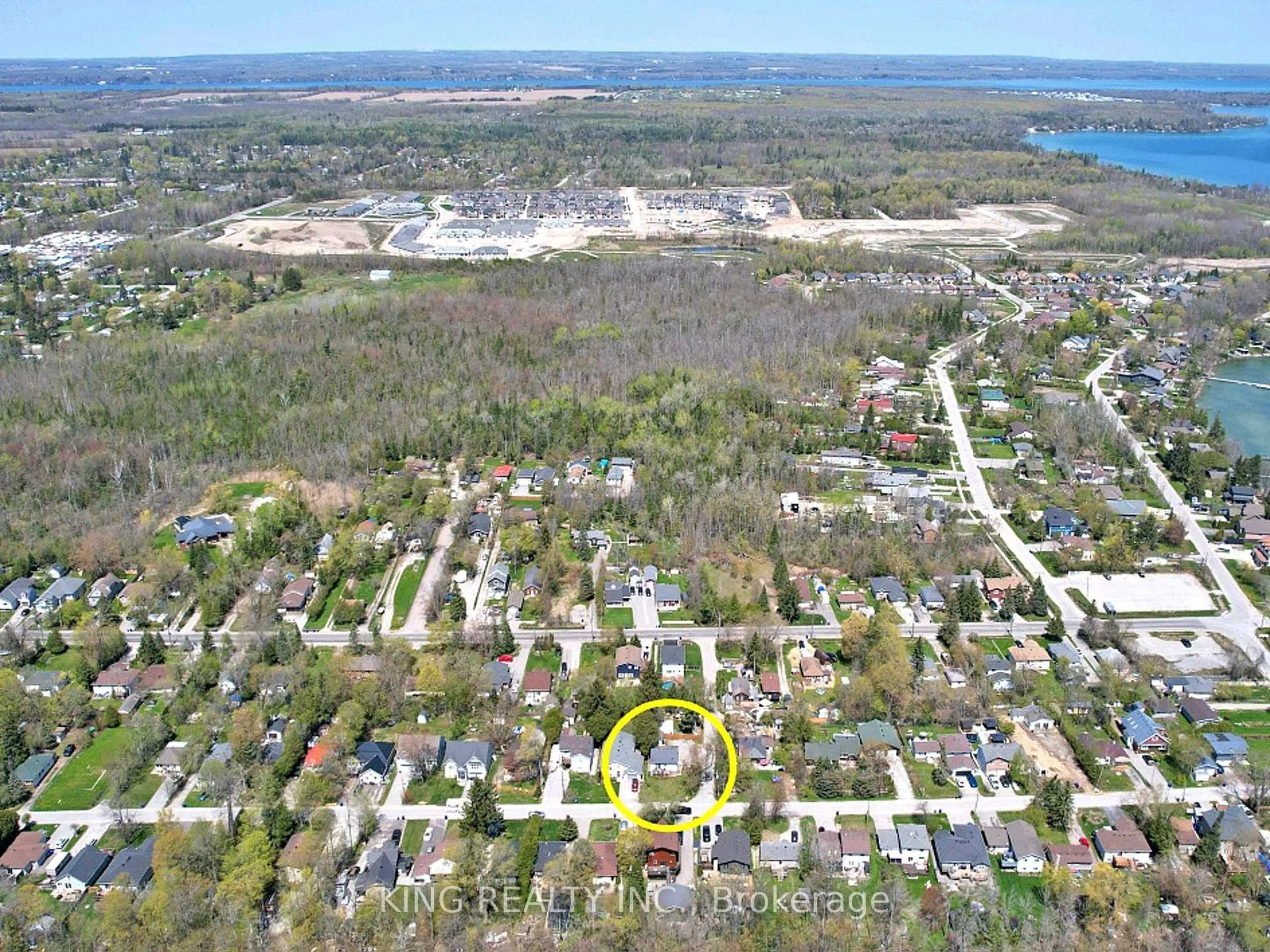 A pic from outside/outdoor area/front of a property/back of a property/a pic from drone, water/lake/river/ocean view for 674 Chestnut St, Innisfil Ontario L9S 2H7