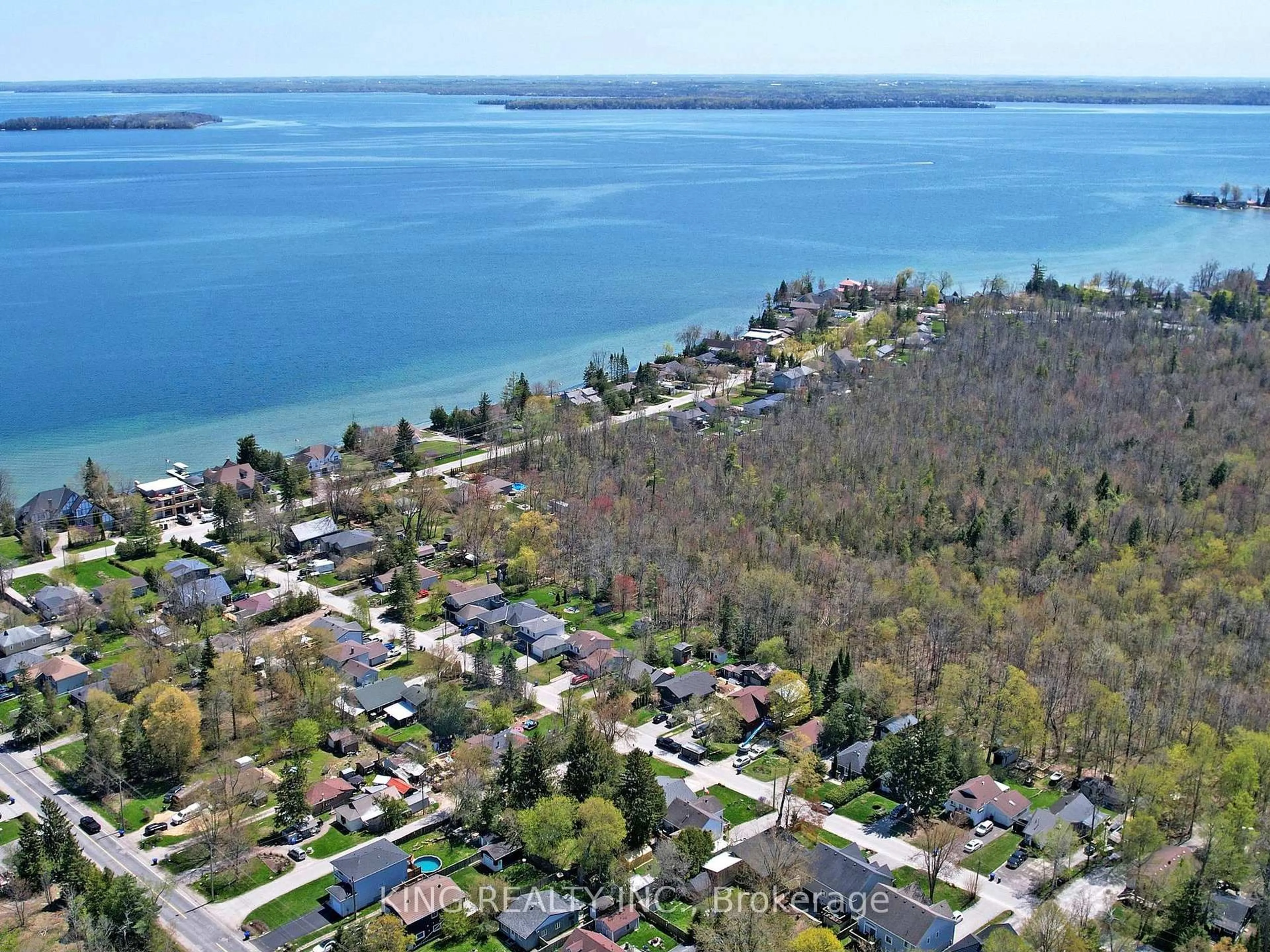 A pic from outside/outdoor area/front of a property/back of a property/a pic from drone, water/lake/river/ocean view for 674 Chestnut St, Innisfil Ontario L9S 2H7