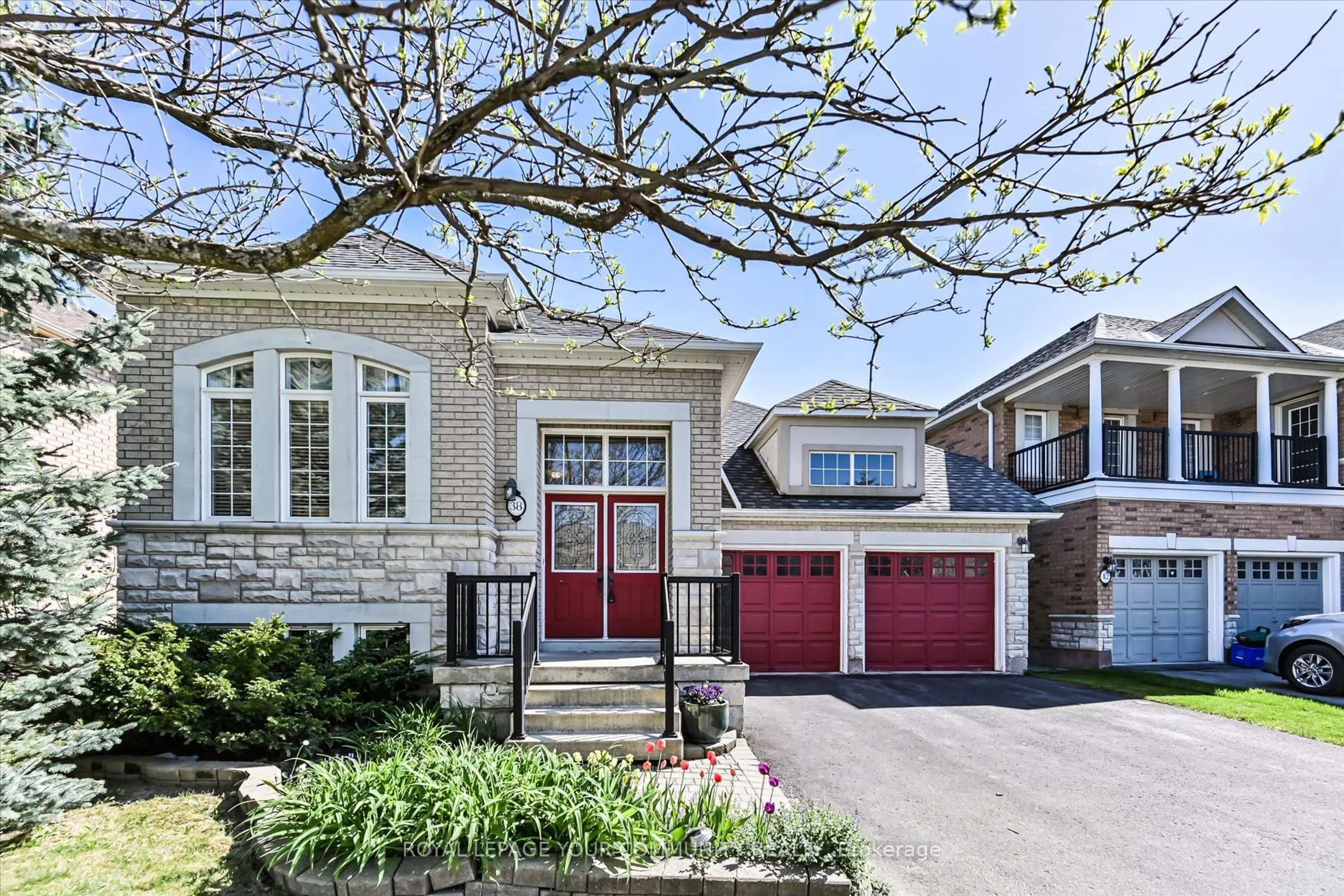 Home with brick exterior material, street for 38 Brass Dr, Richmond Hill Ontario L4E 4T3