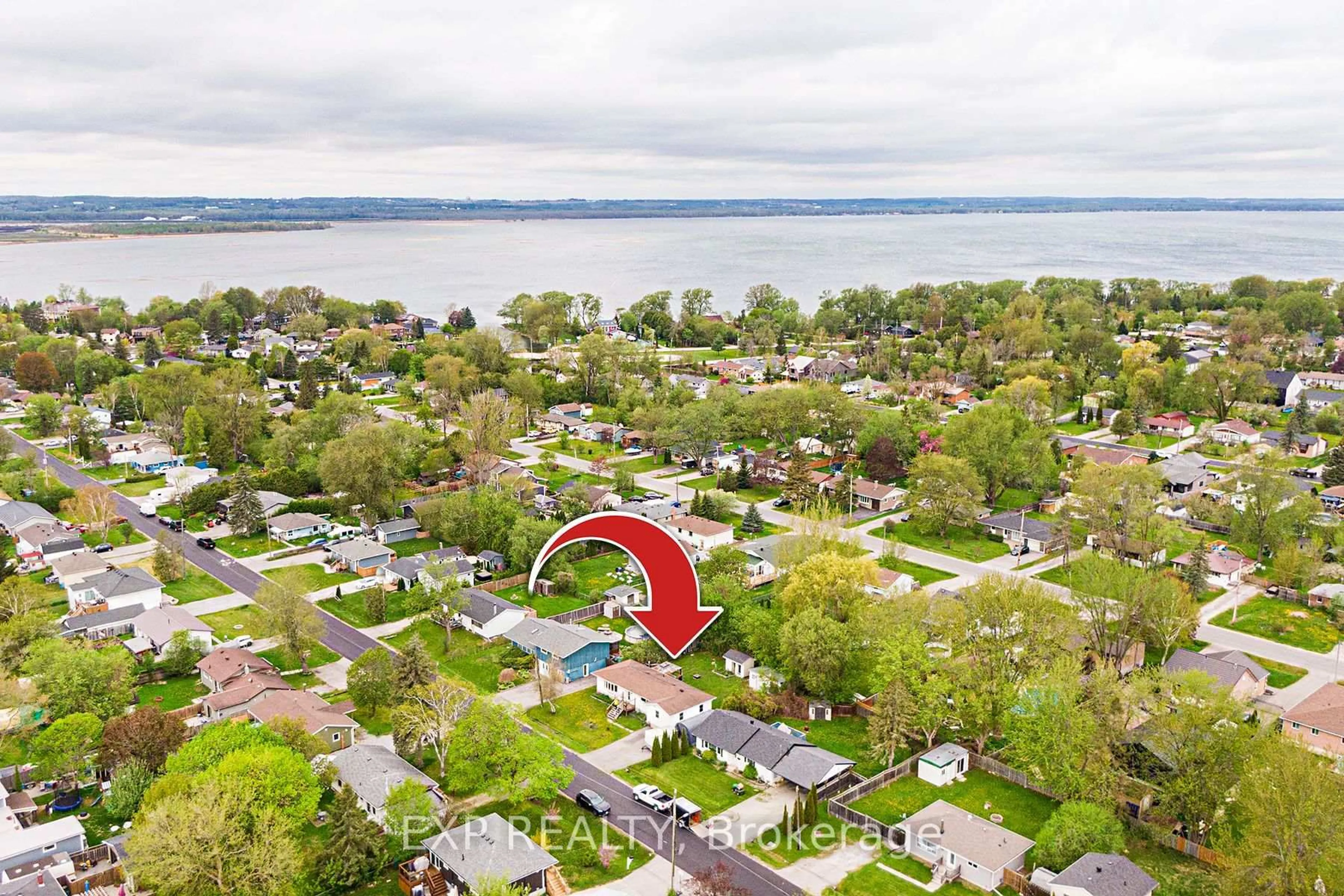 A pic from outside/outdoor area/front of a property/back of a property/a pic from drone, water/lake/river/ocean view for 346 Winnifred Dr, Georgina Ontario L4P 3B7