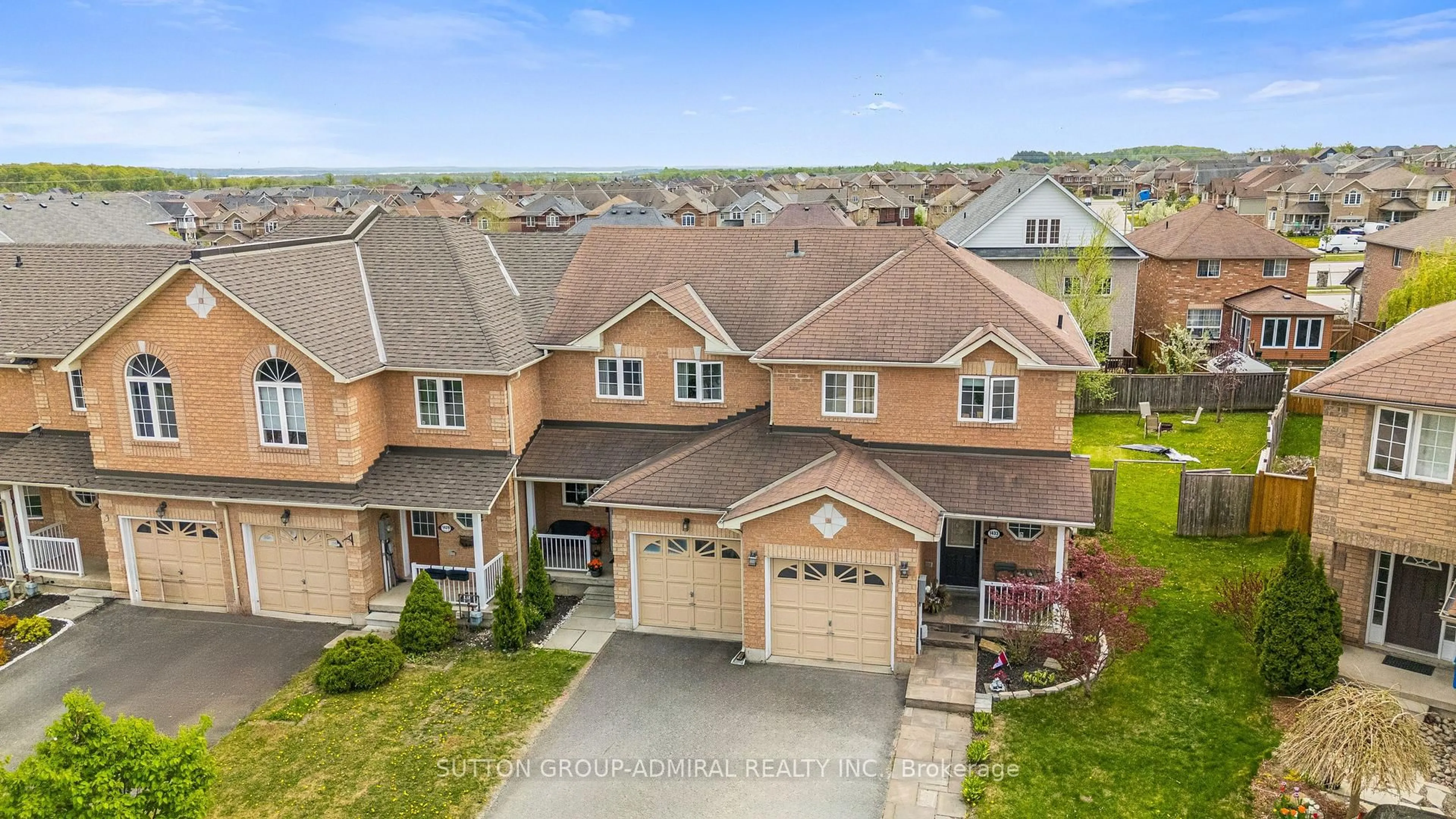 A pic from outside/outdoor area/front of a property/back of a property/a pic from drone, street for 1431 Rankin Way, Innisfil Ontario L9S 0C5