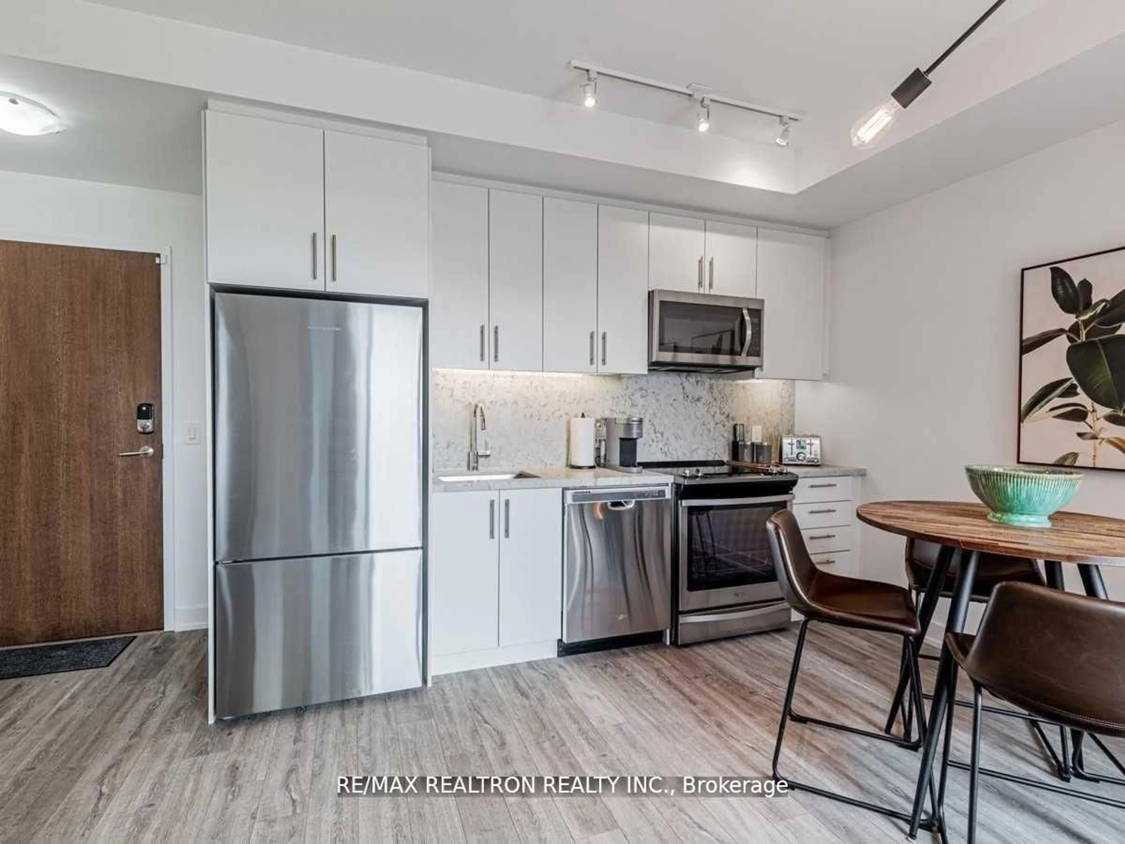 Open concept kitchen, unknown for 333 Sea Ray Ave #D203, Innisfil Ontario L9S 0L9